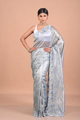 Tissue with hand embroidered border