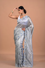 Tissue with hand embroidered border