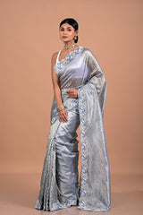 Tissue with hand embroidered border