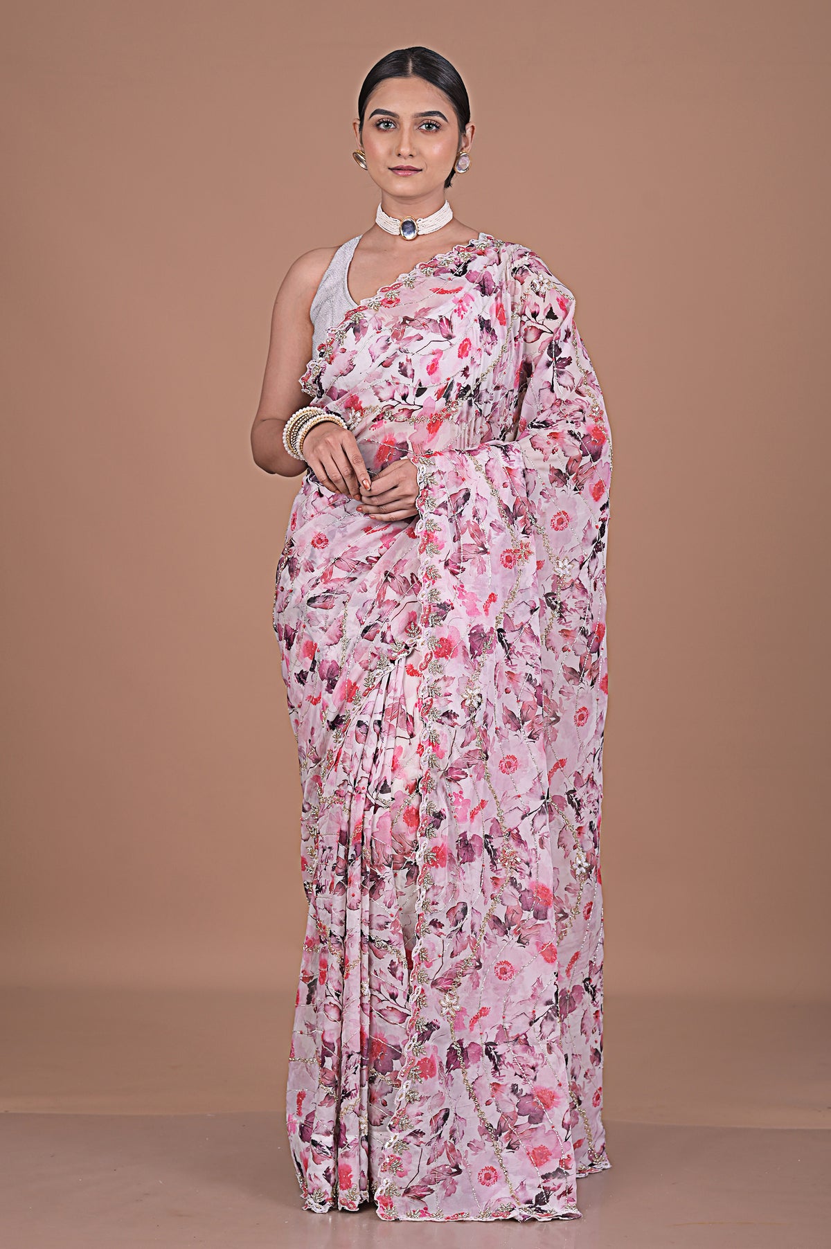 Georgette Printed saree with hand embroidered border