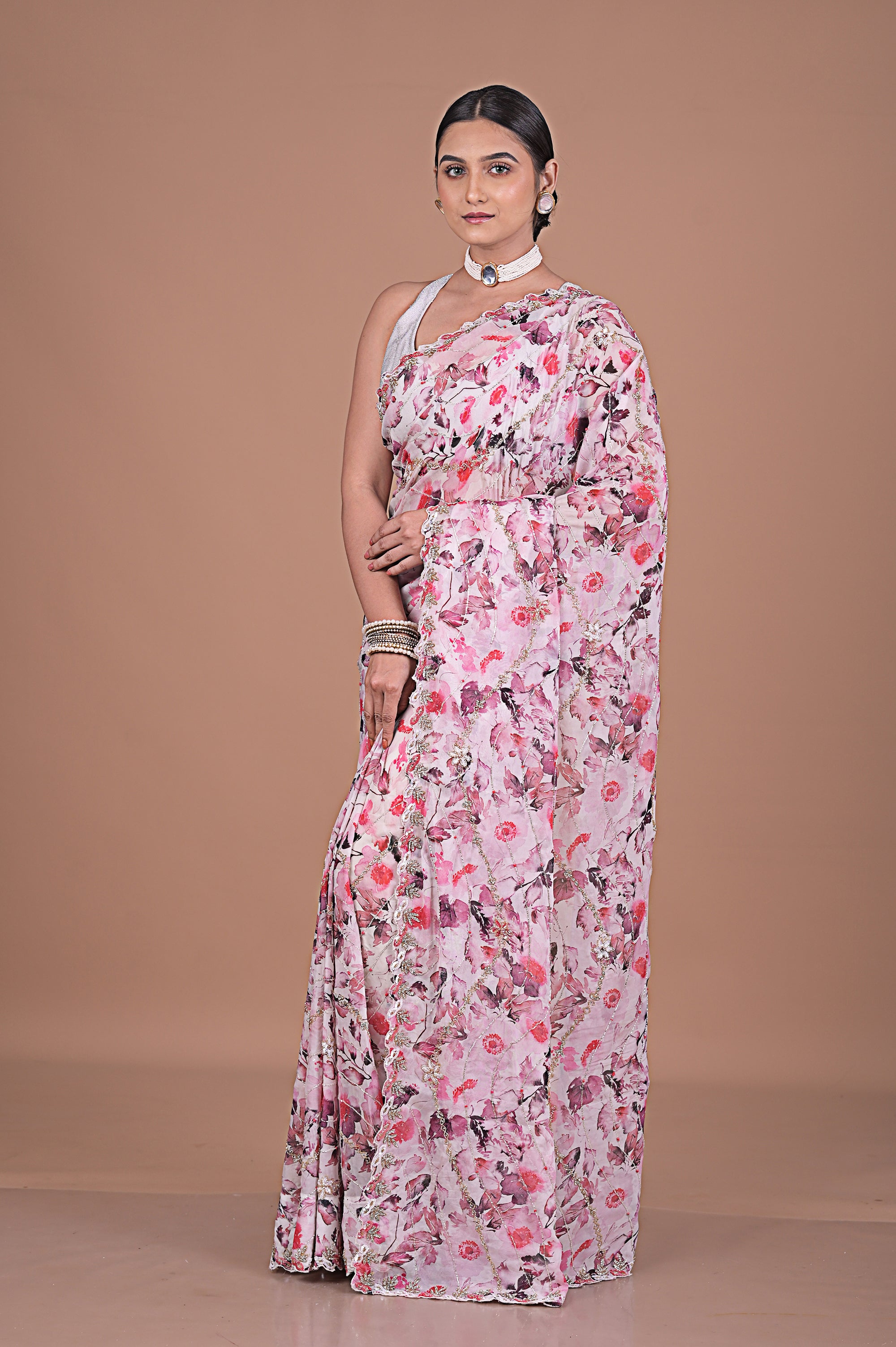 Georgette Printed saree with hand embroidered border