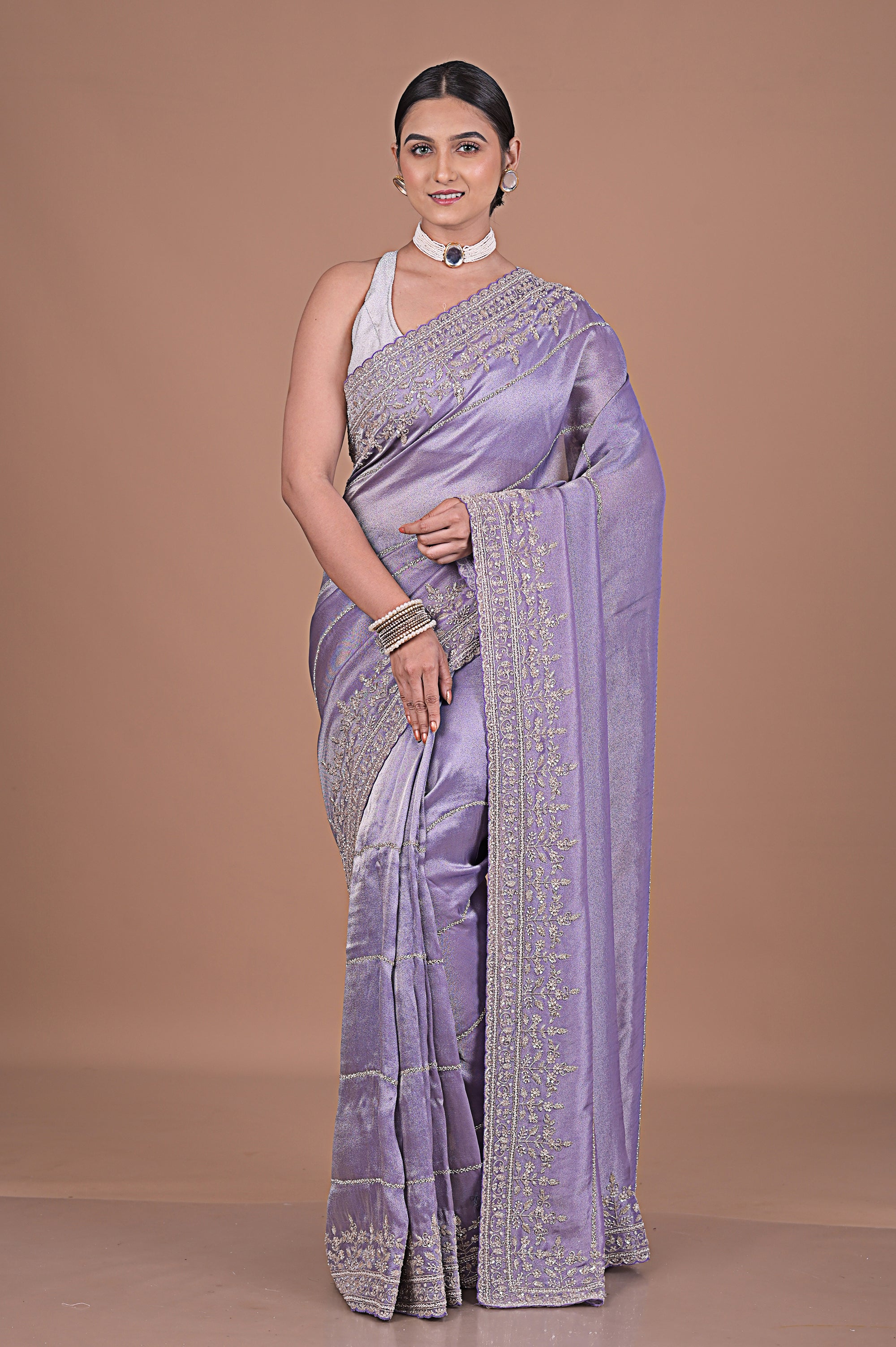 Silk tissue saree with cutdana work embroidery