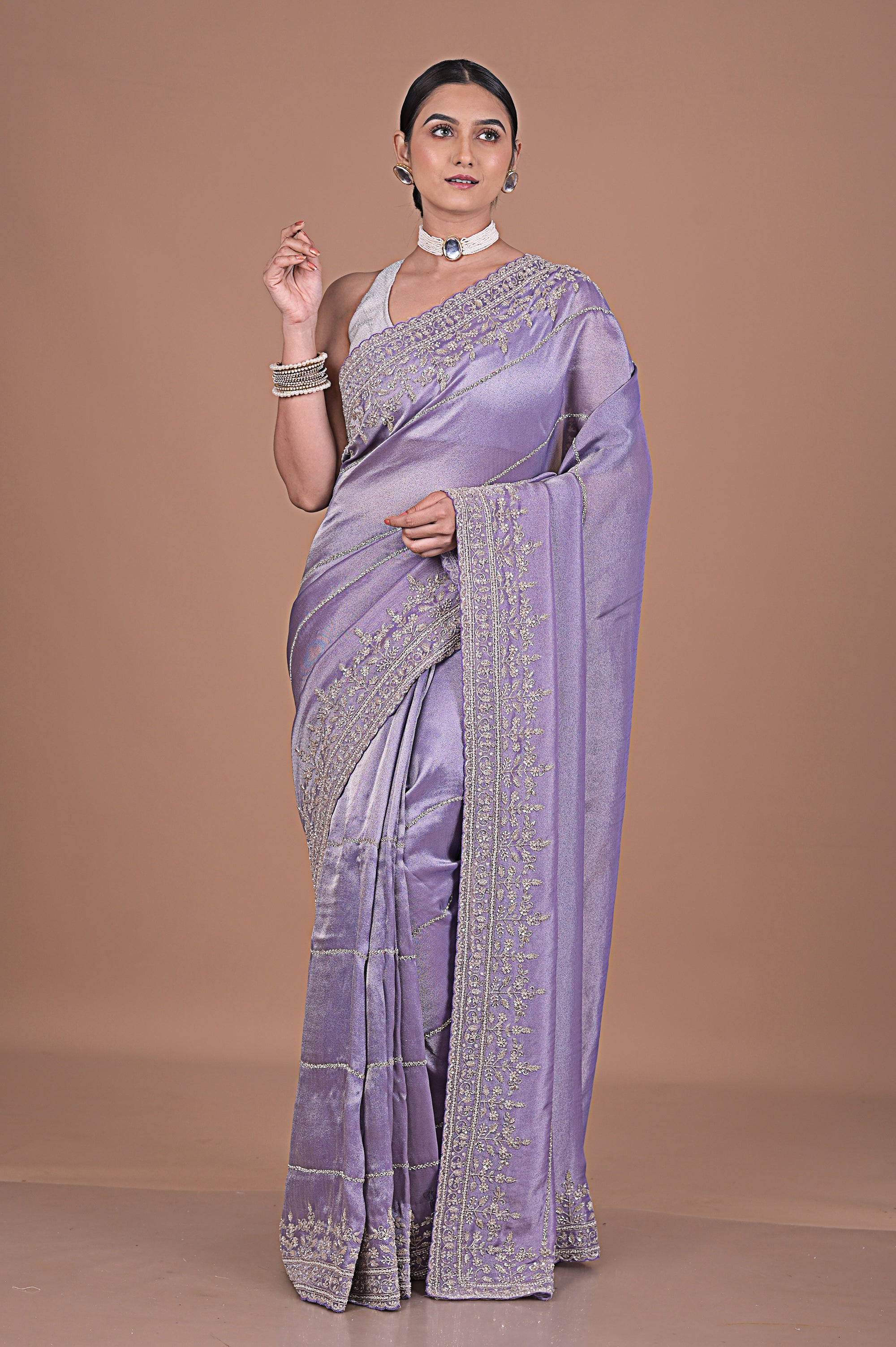 Silk tissue saree with cutdana work embroidery