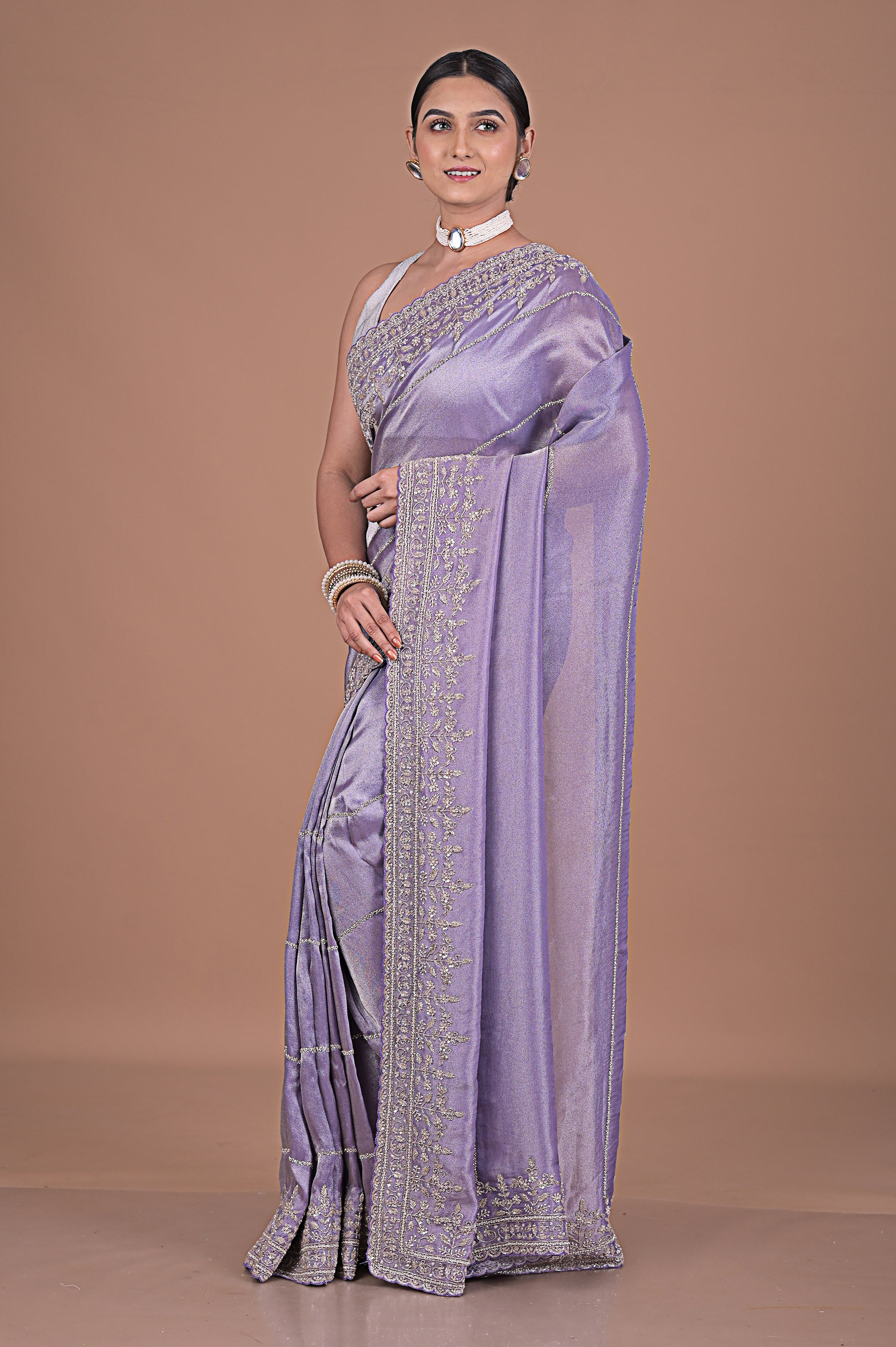 Silk tissue saree with cutdana work embroidery