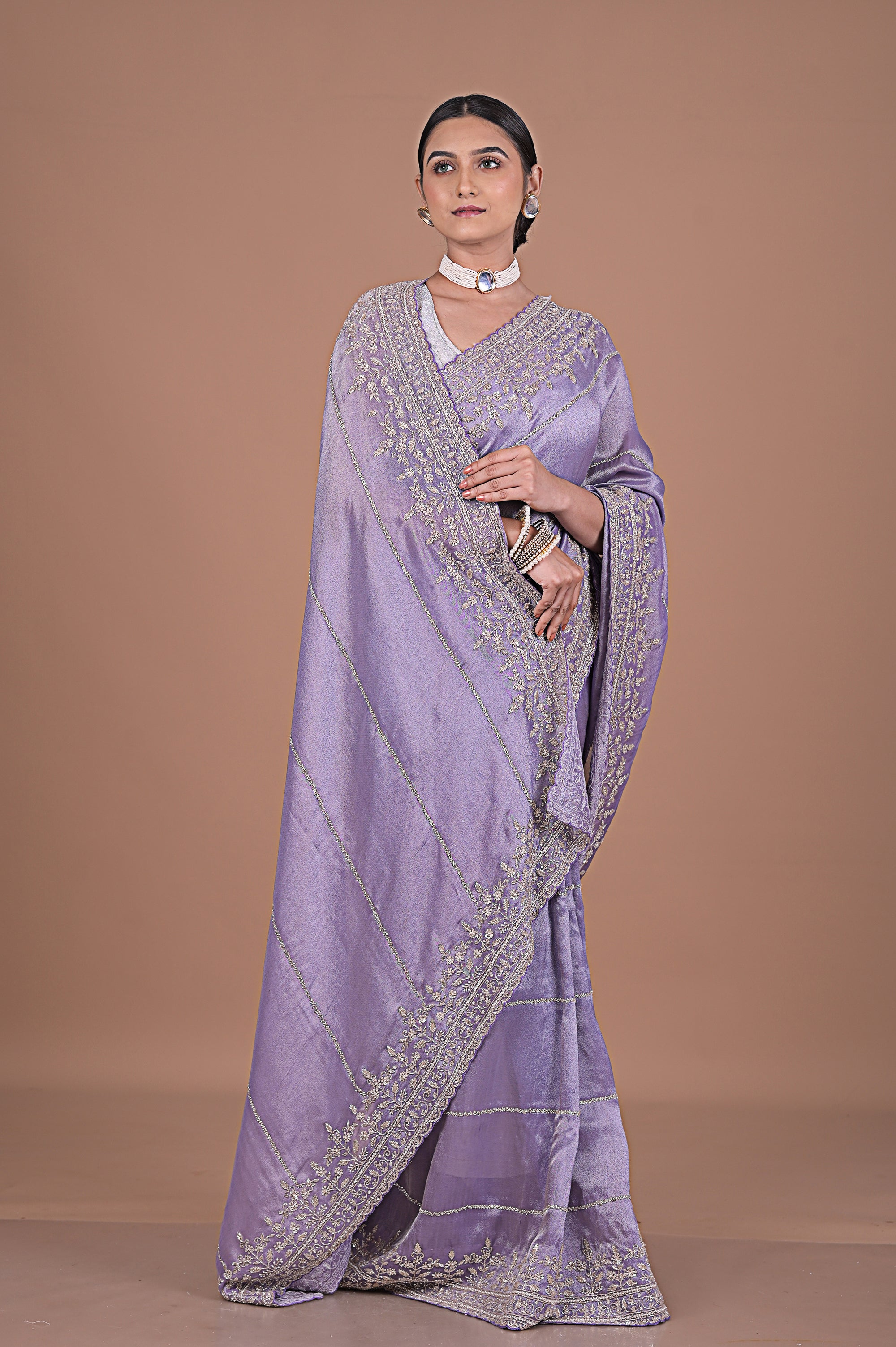 Silk tissue saree with cutdana work embroidery