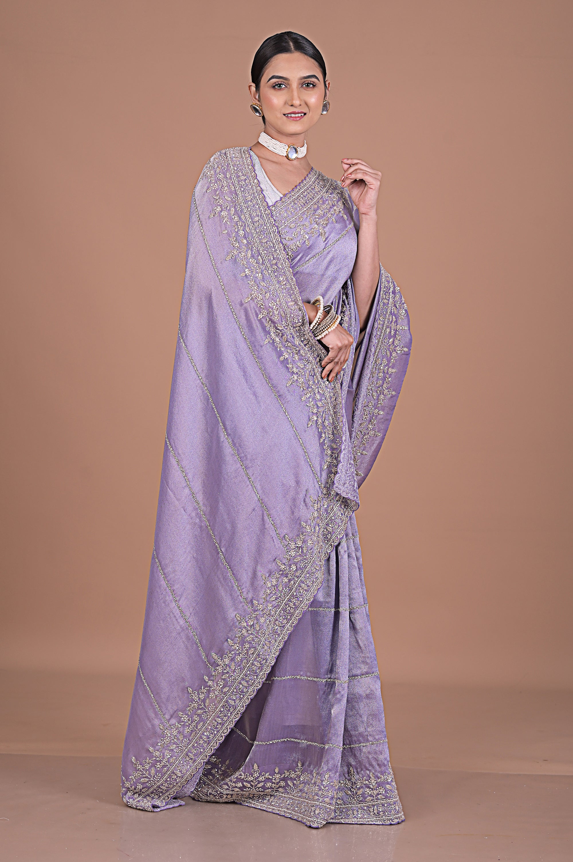 Silk tissue saree with cutdana work embroidery