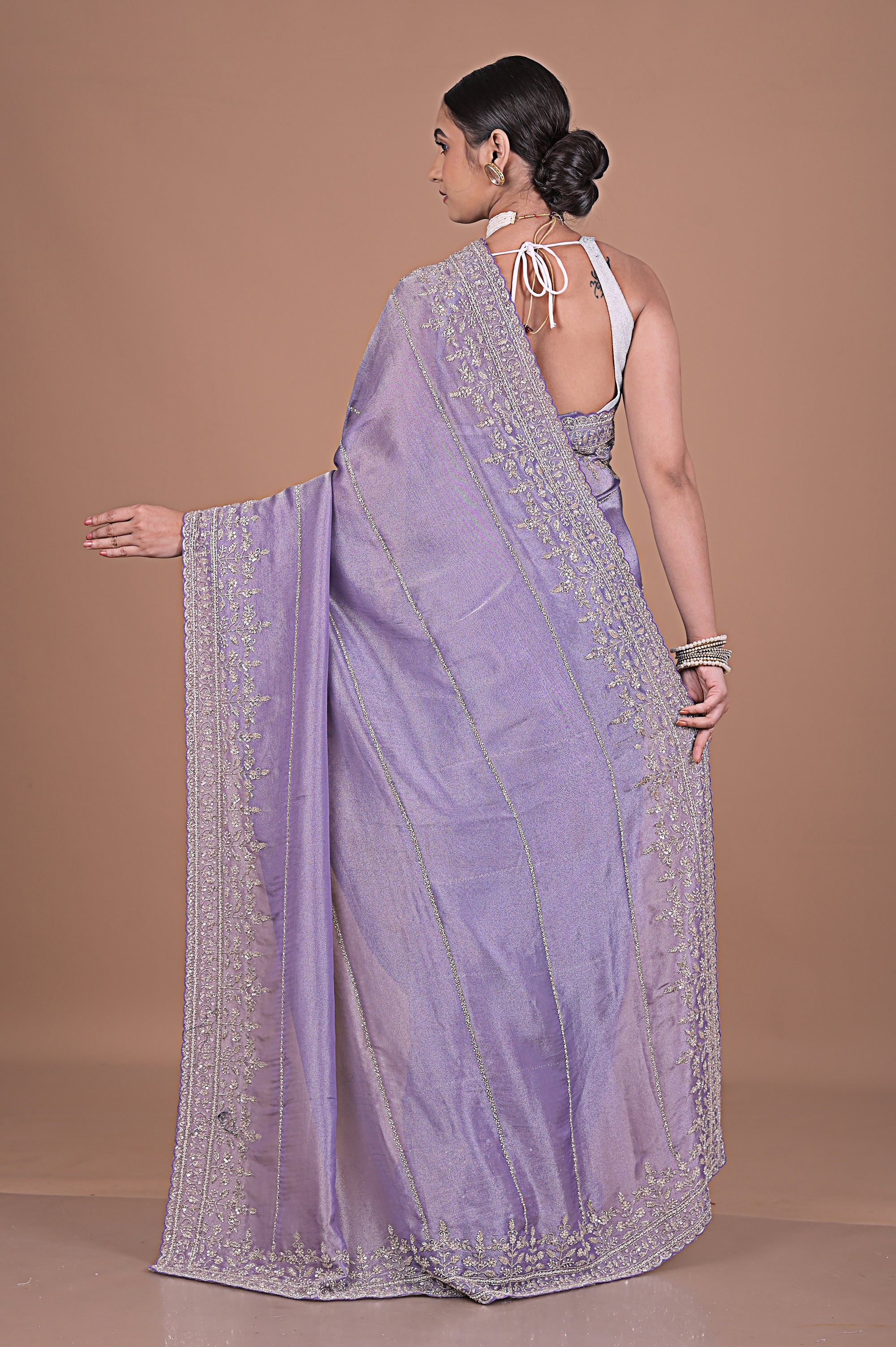 Silk tissue saree with cutdana work embroidery