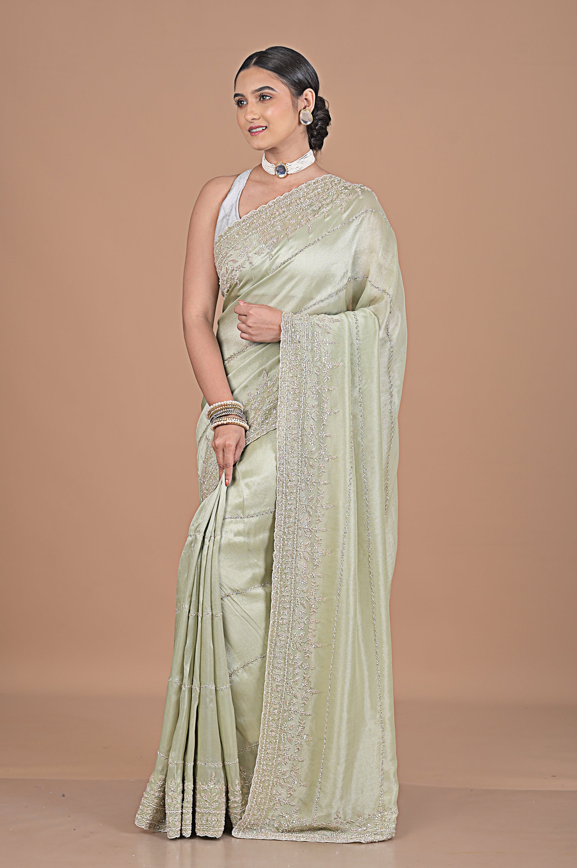 Silk tissue saree with cutdana work embroidery