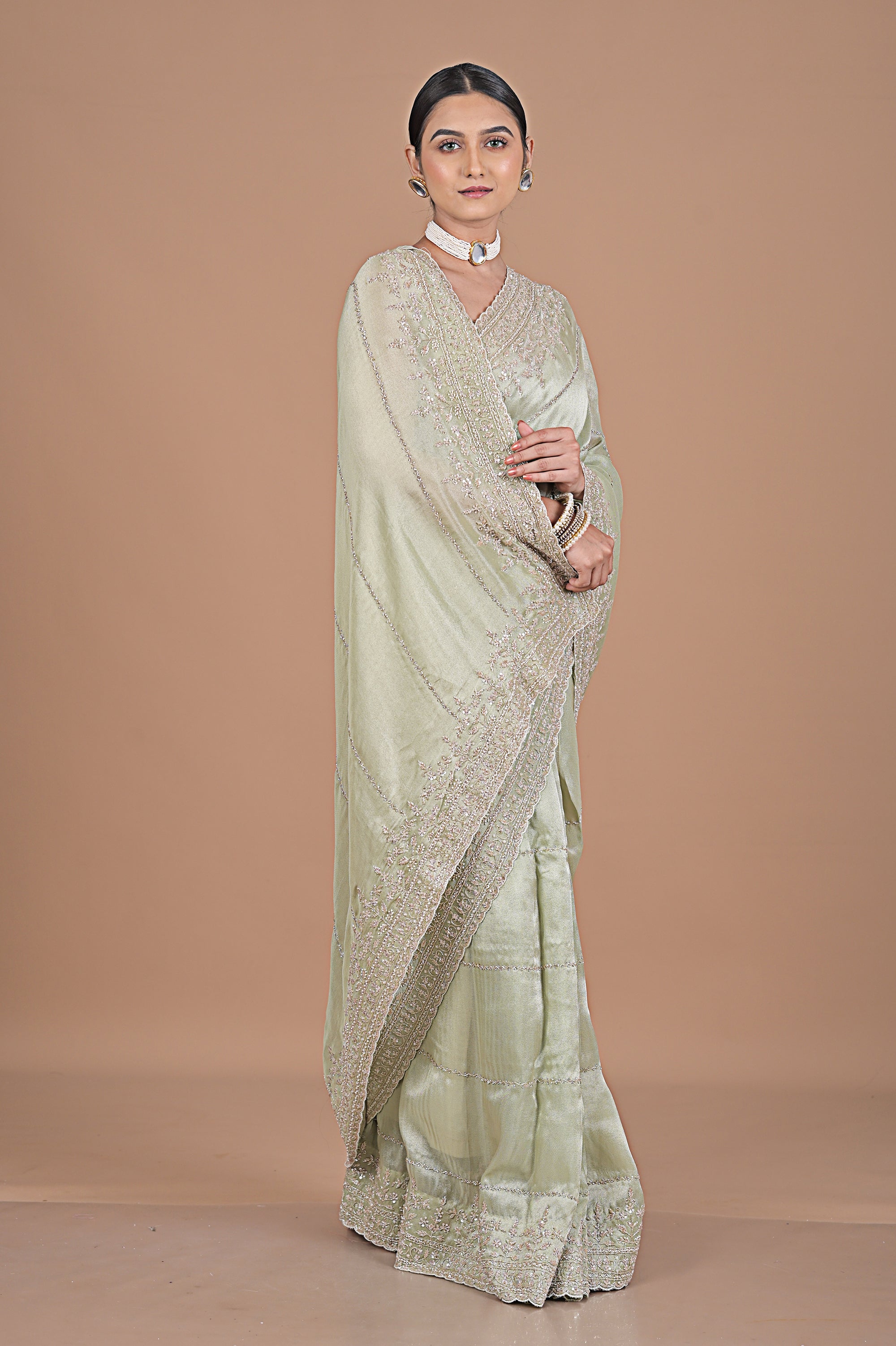 Silk tissue delicately embroidered with zardosi work