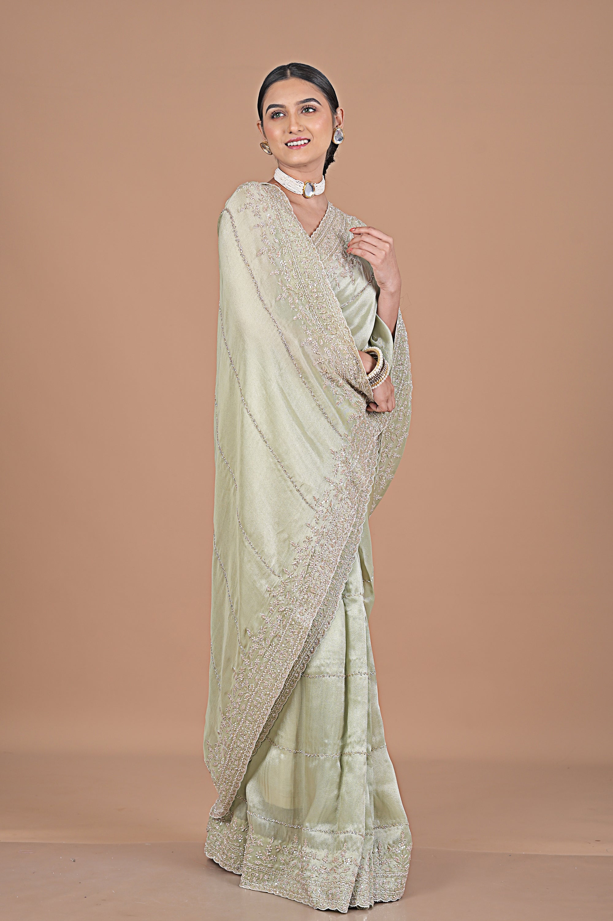 Silk tissue delicately embroidered with zardosi work