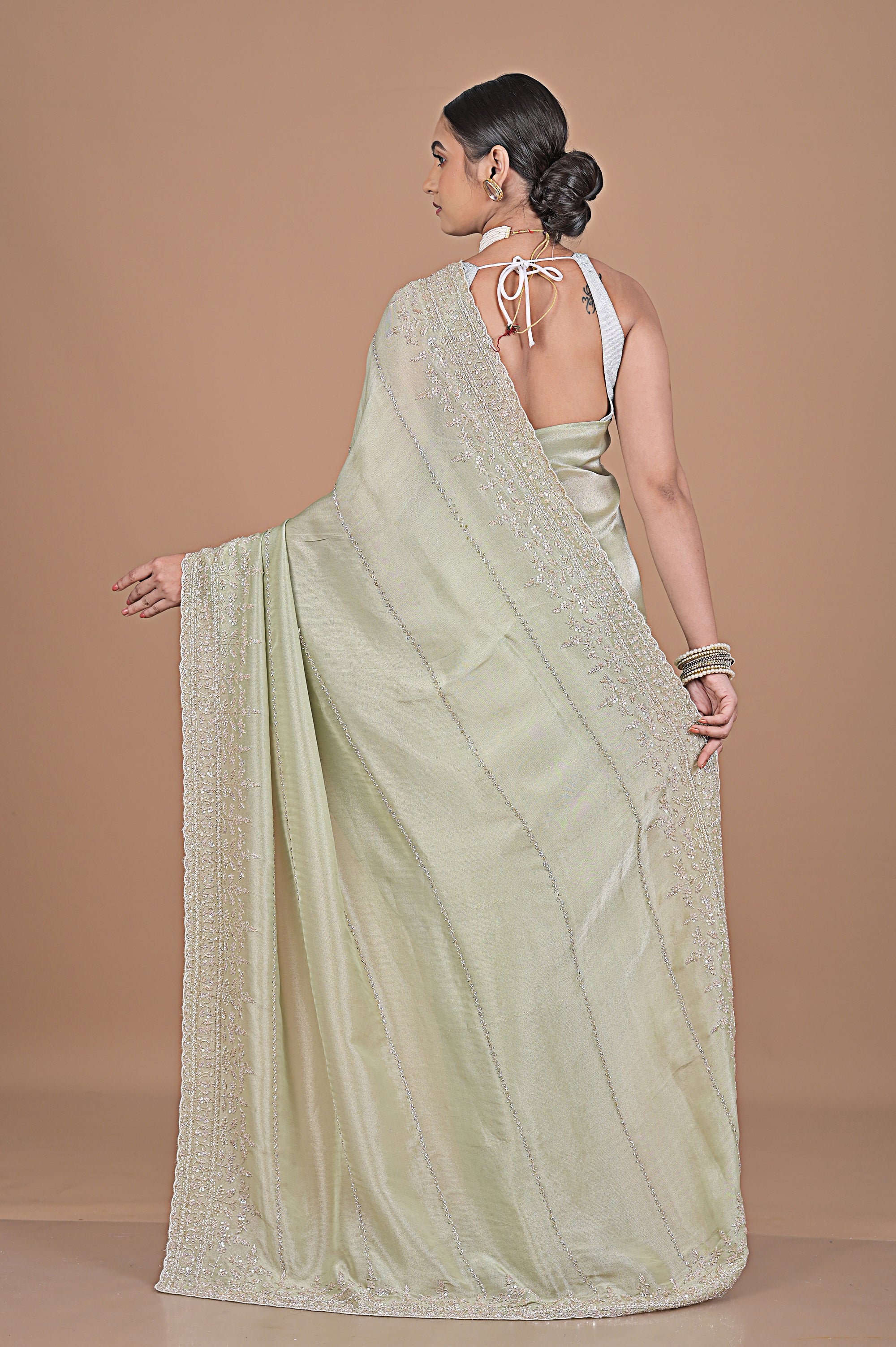 Silk tissue delicately embroidered with zardosi work