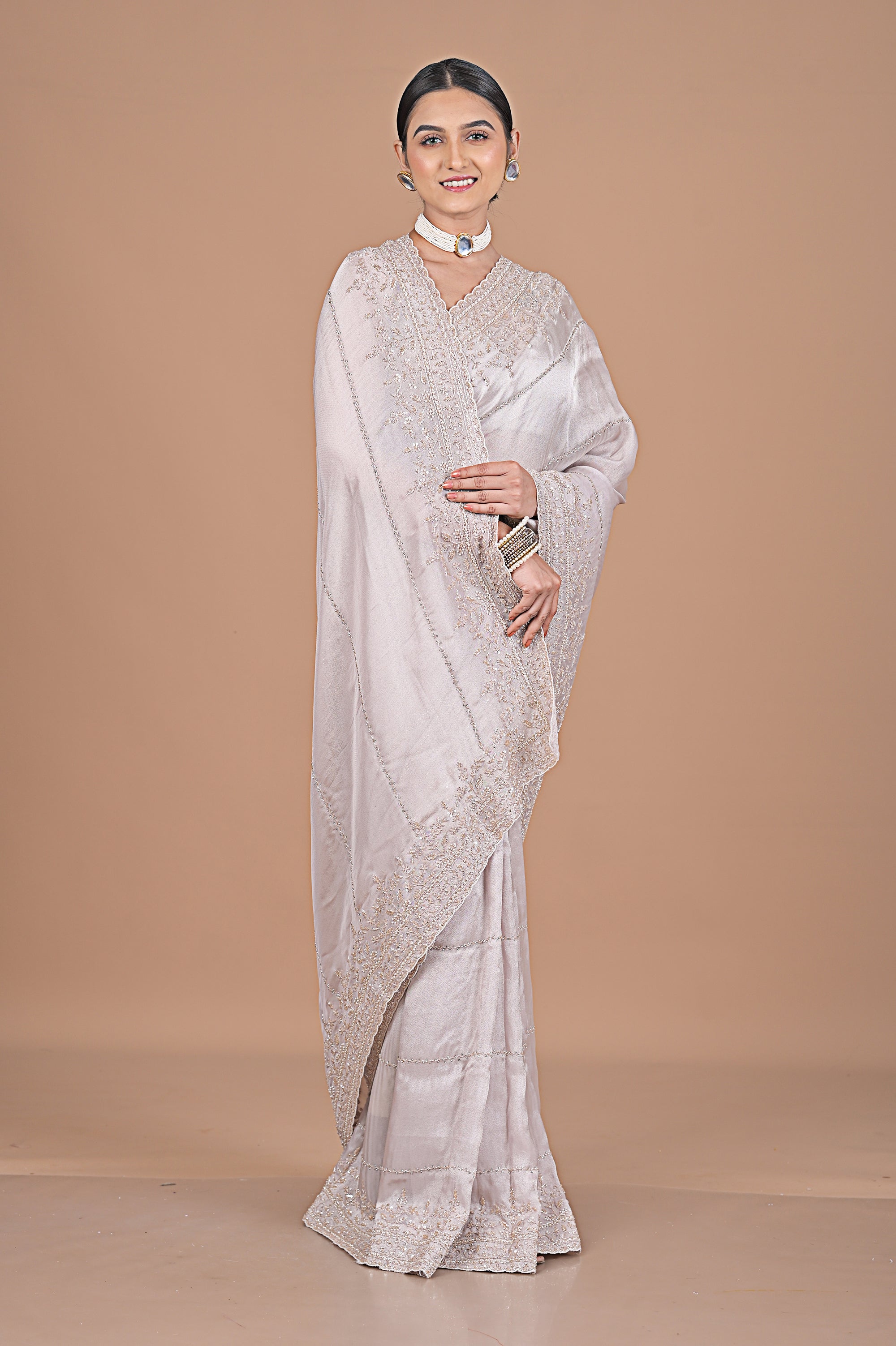 Silk tissue delicately embroidered with zardosi work