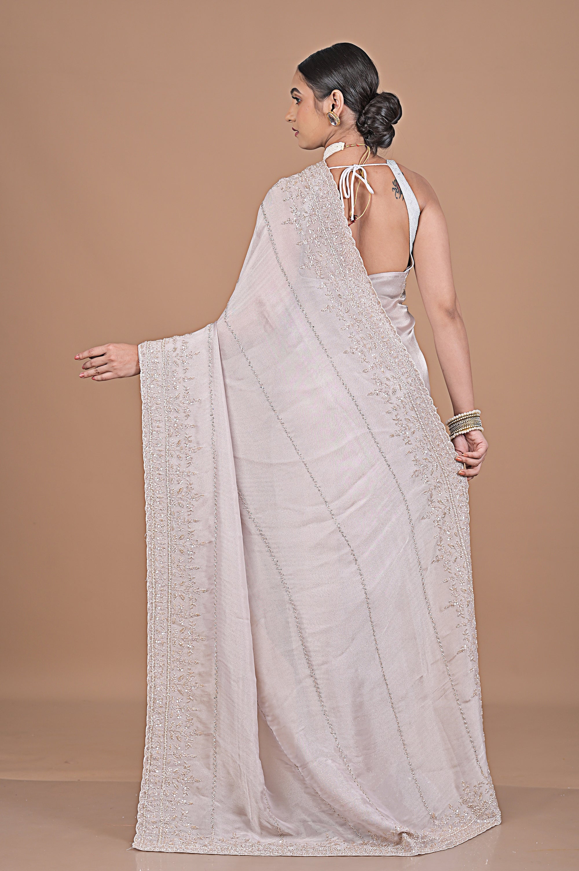 Silk tissue delicately embroidered with zardosi work