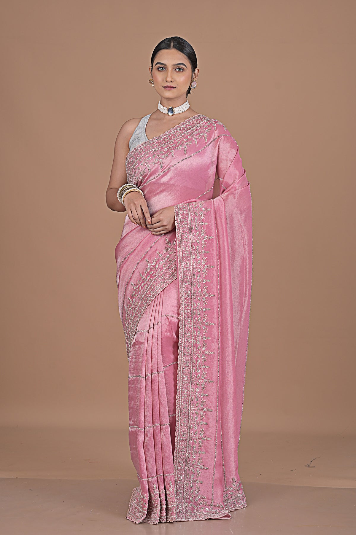 Silk tissue saree with cutdana work embroidery