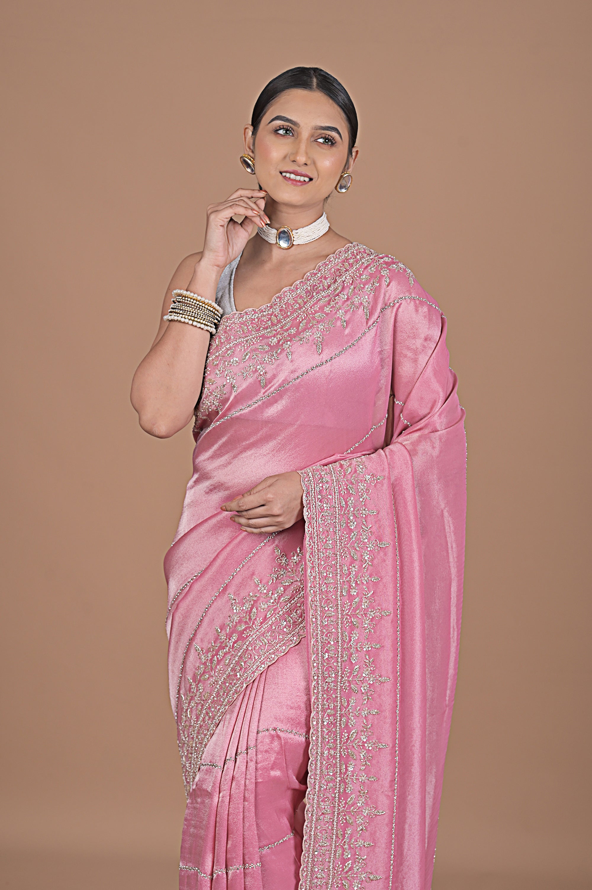 Silk tissue saree with cutdana work embroidery