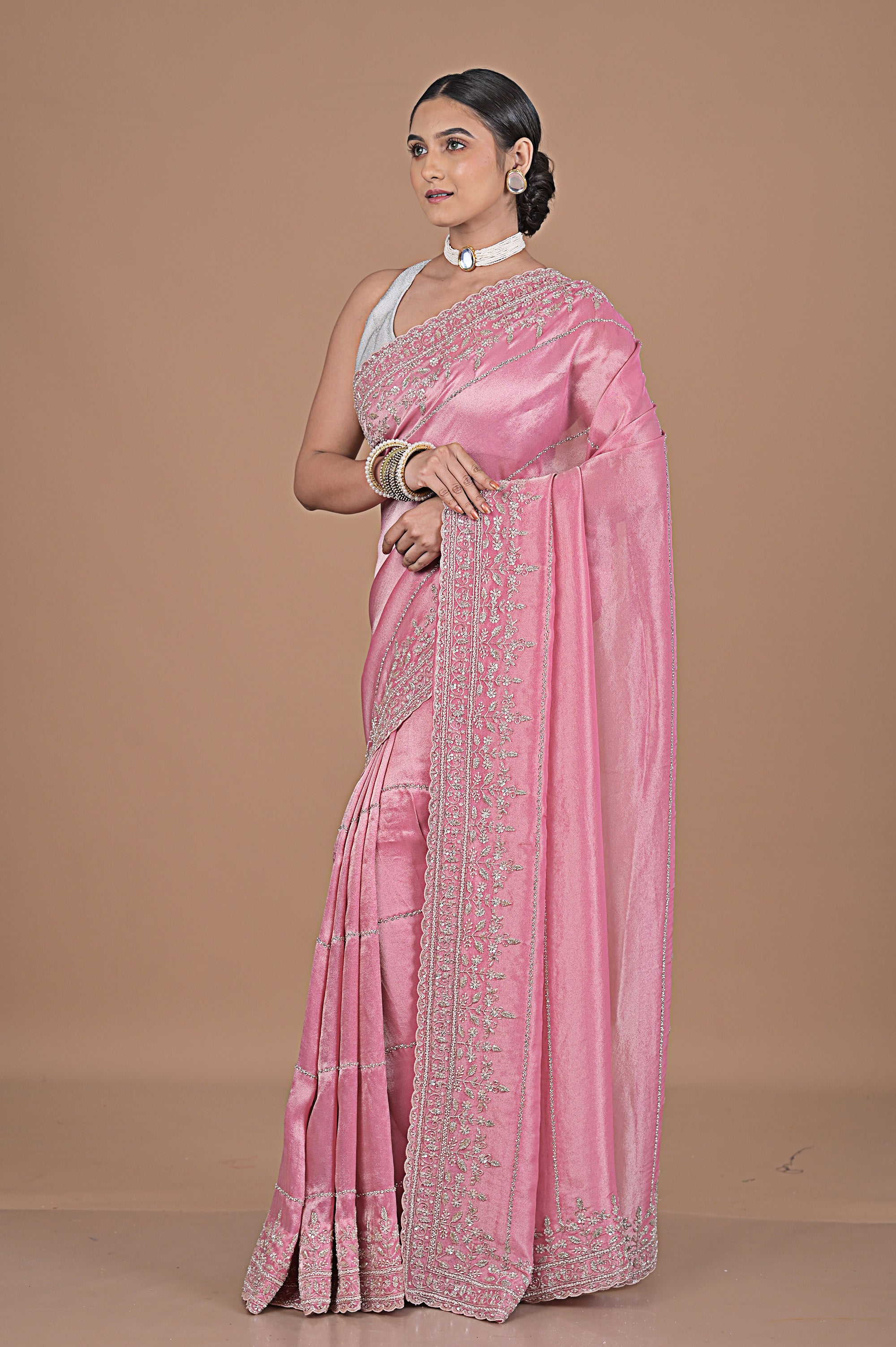 Silk tissue saree with cutdana work embroidery