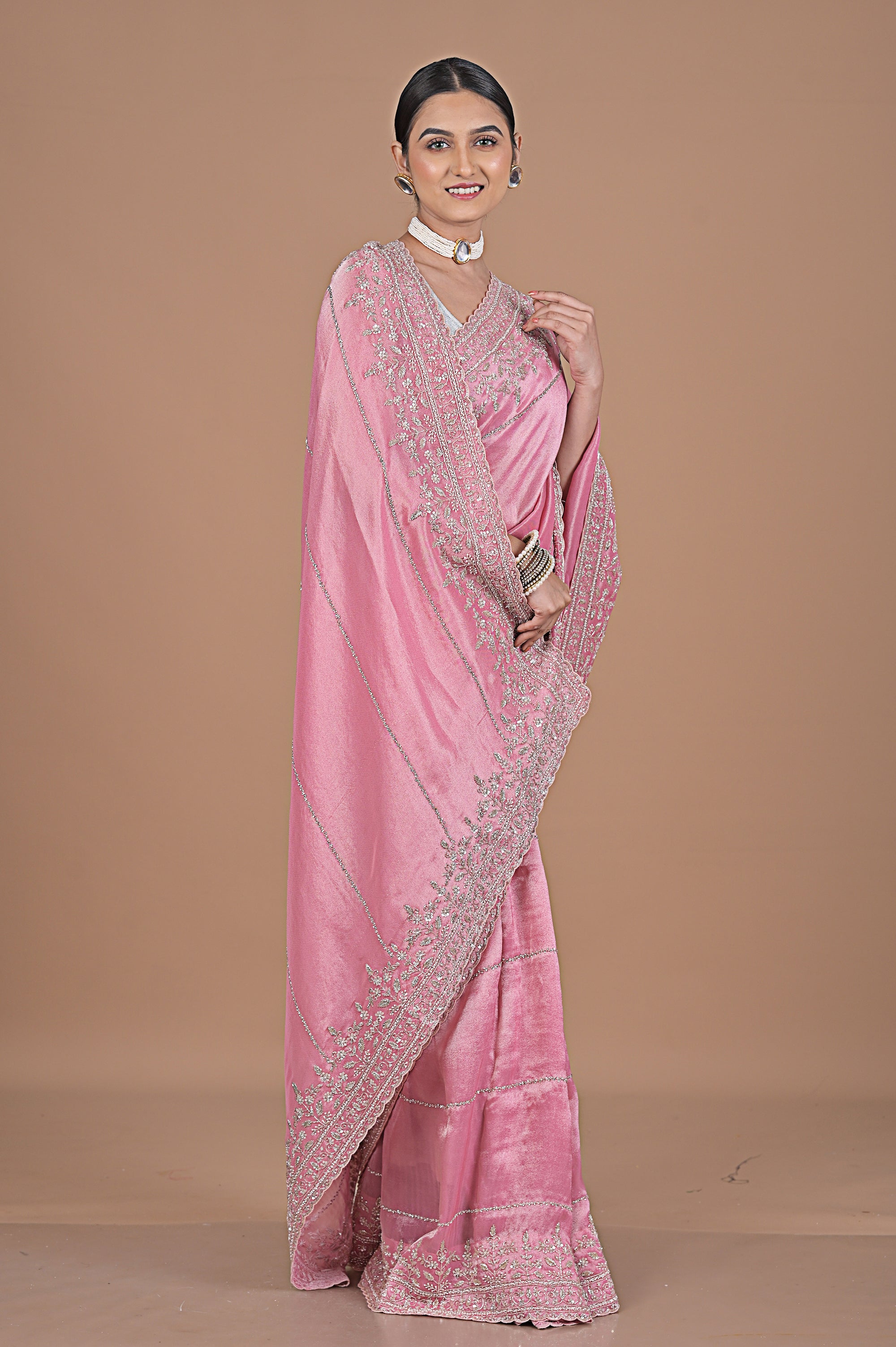 Silk tissue delicately embroidered with zardosi work