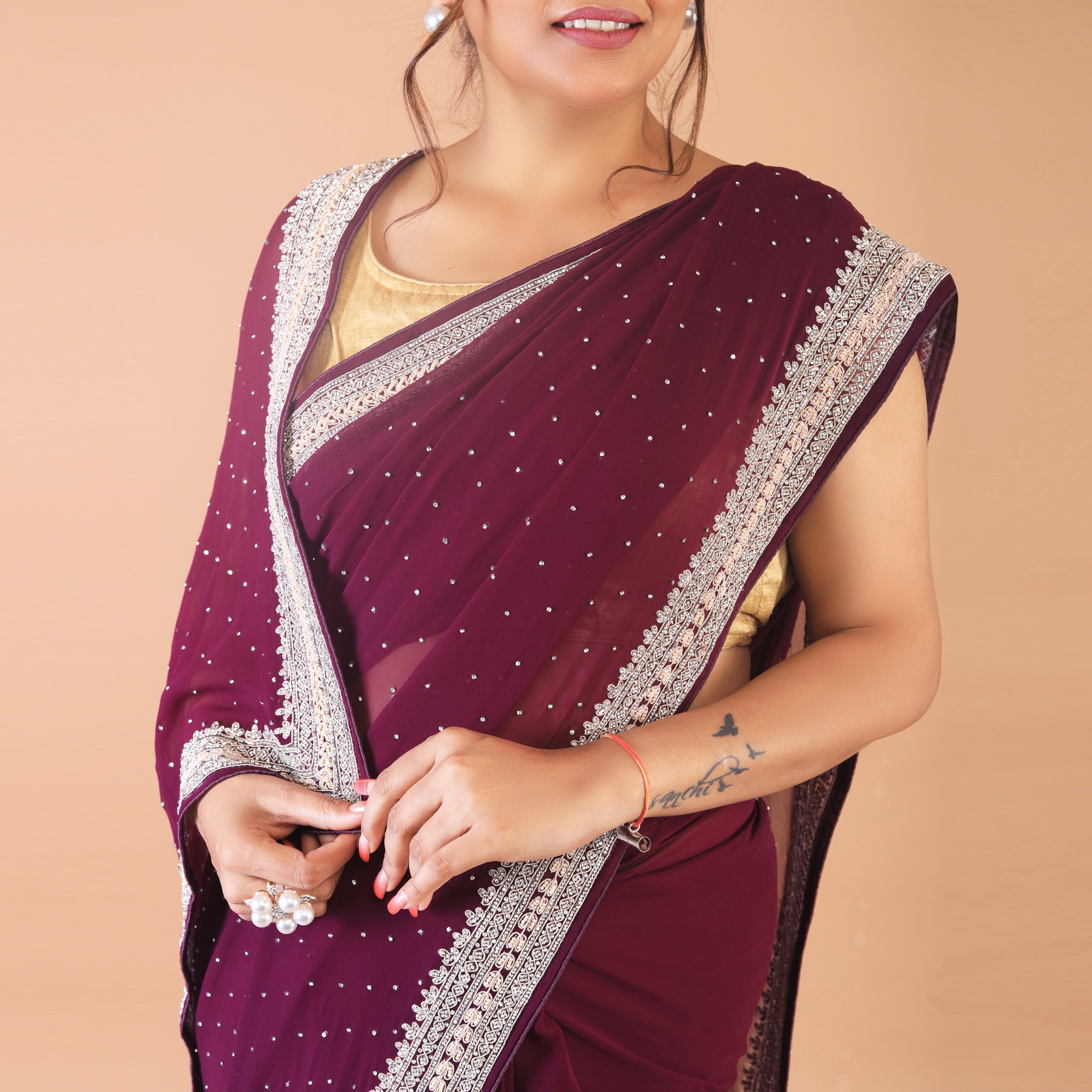 georgette  with cutdana and pearly border work