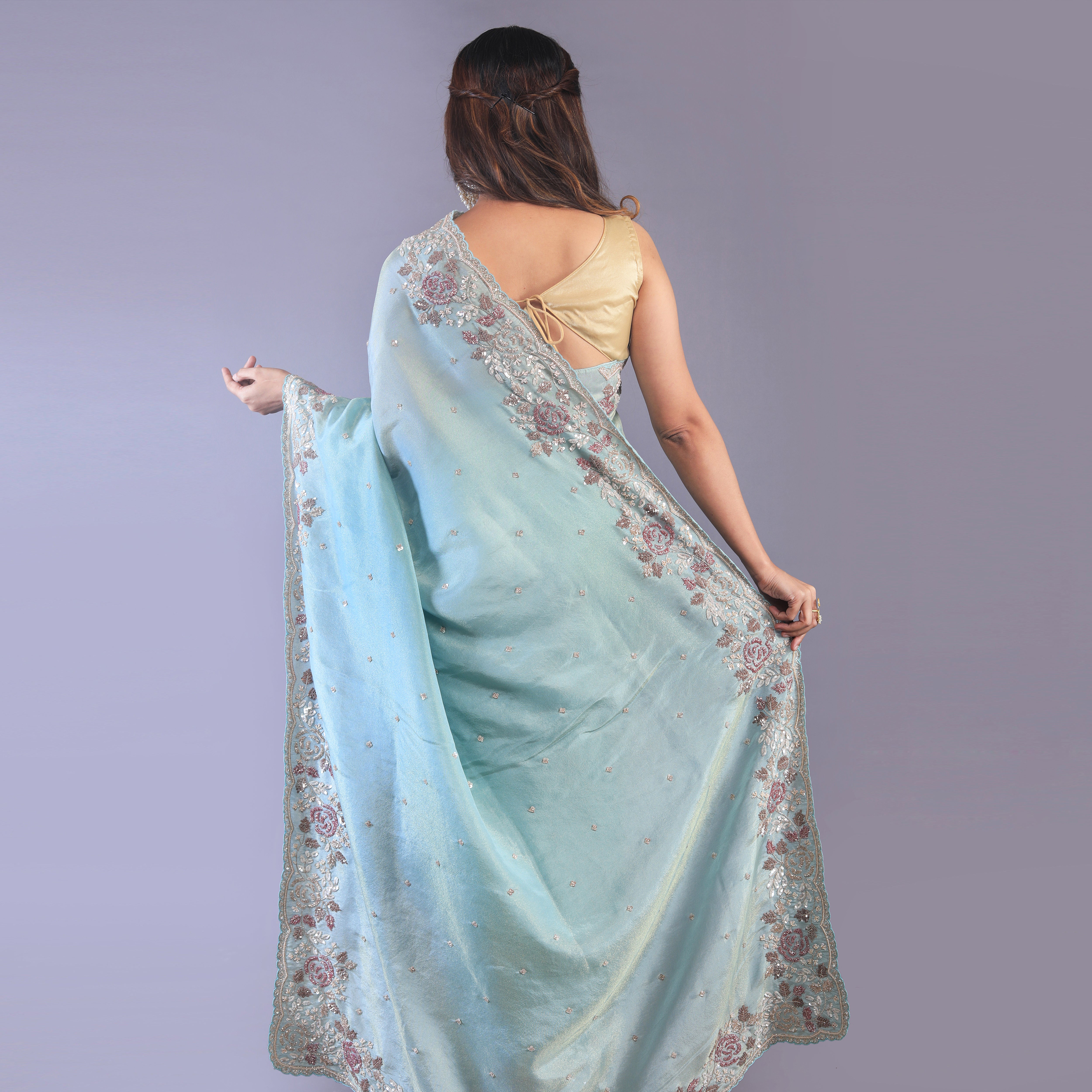 Hand embroidered silk tissue saree