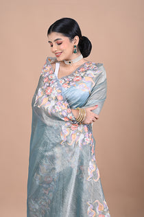 Tissue saree with machine embroidery