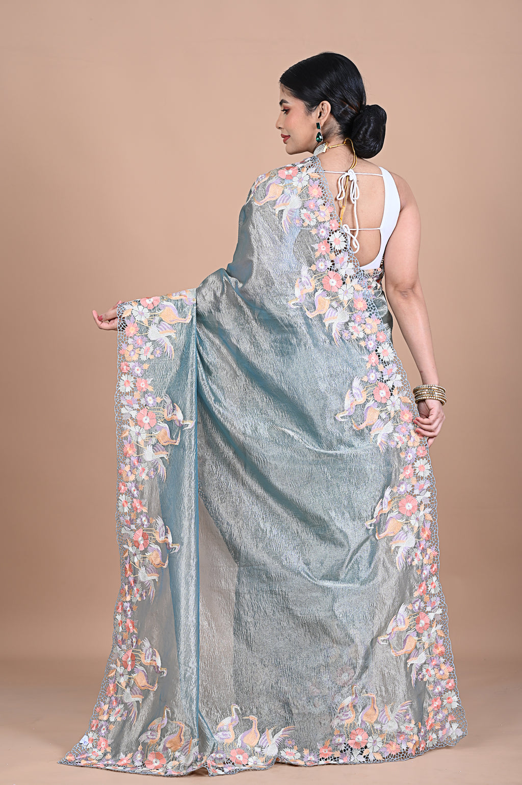 Tissue saree with machine embroidery