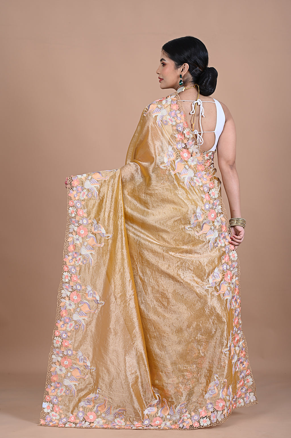 Tissue saree with machine embroidery