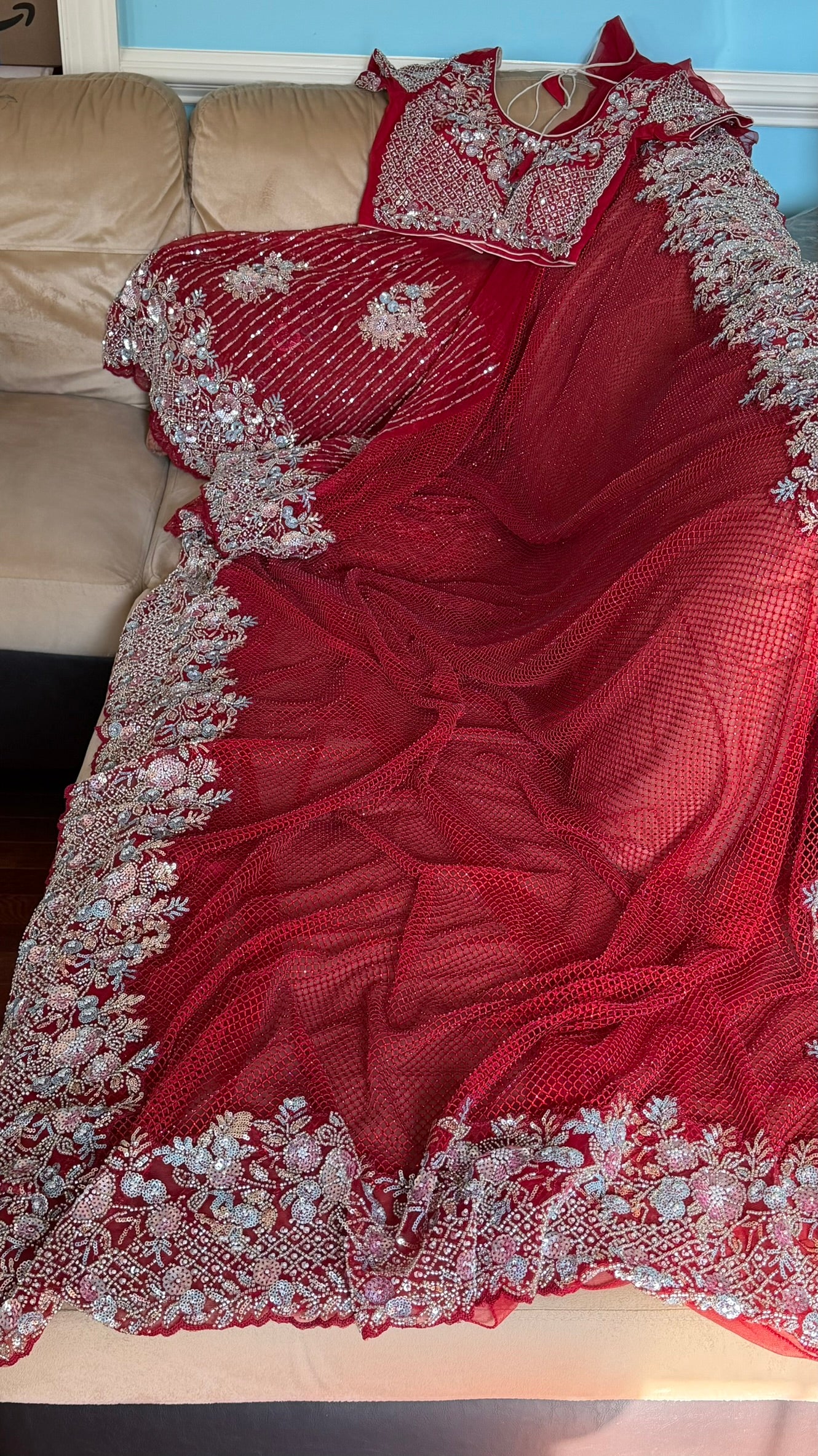 Net saree with heavy embroidered blouse and border