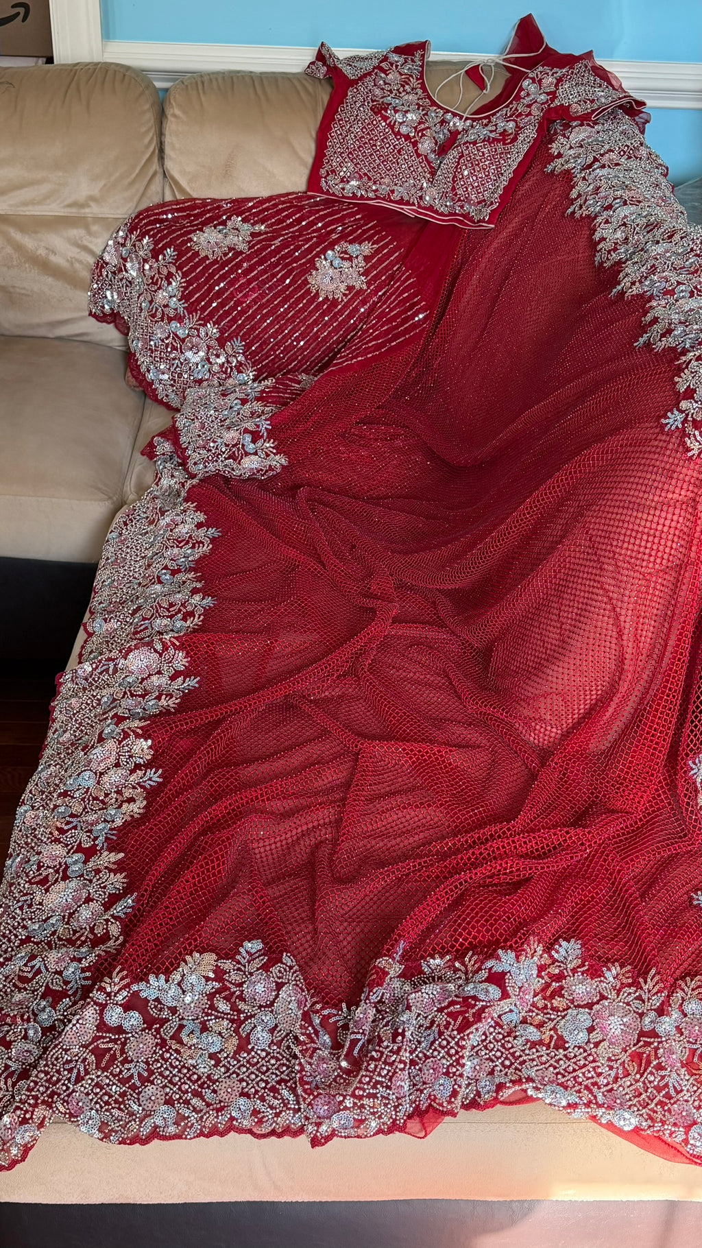 Net saree with heavy embroidered blouse and border