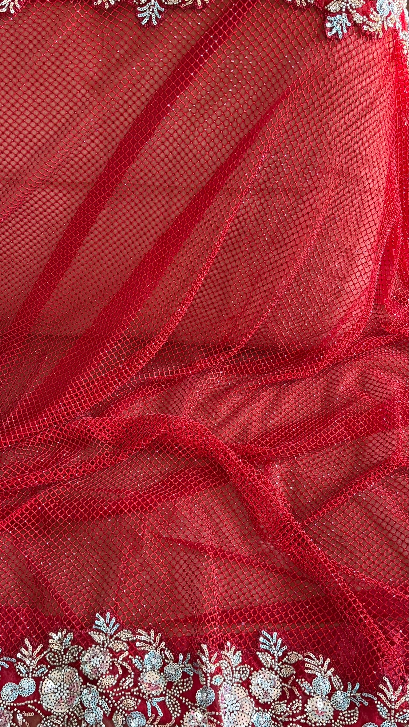 Net saree with heavy embroidered blouse and border