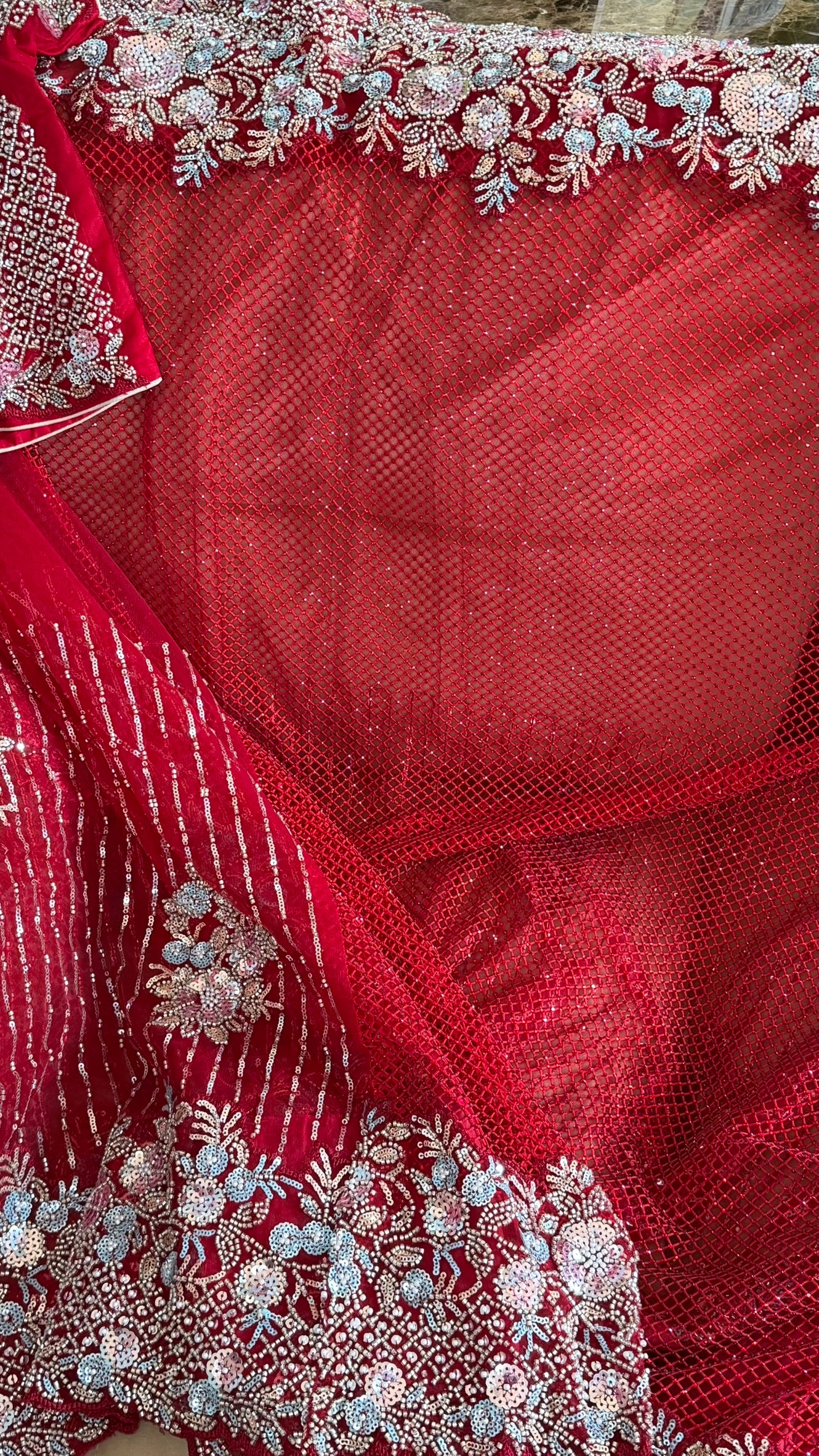 Net saree with heavy embroidered blouse and border