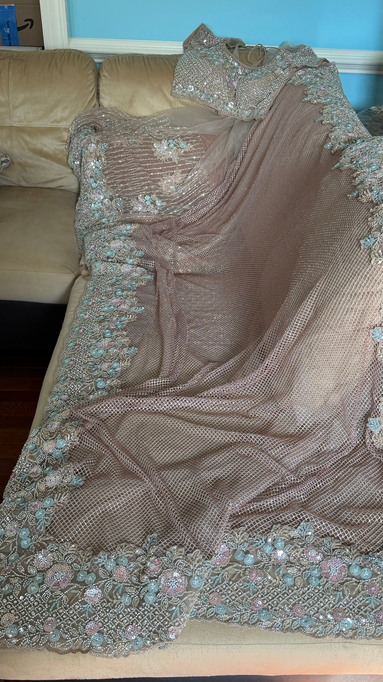 Net saree with heavy embroidered blouse and border