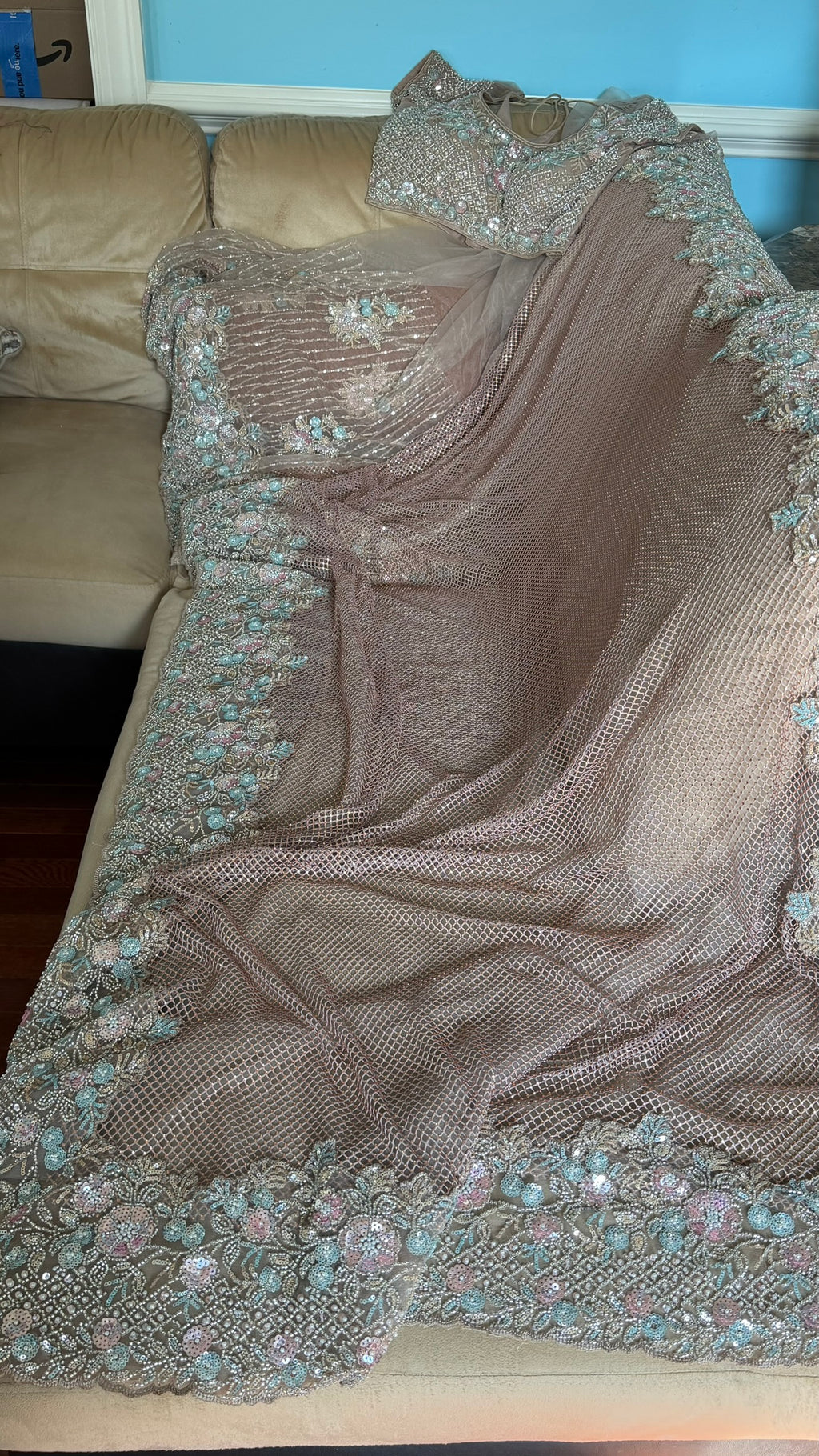 Net saree with heavy embroidered blouse and border