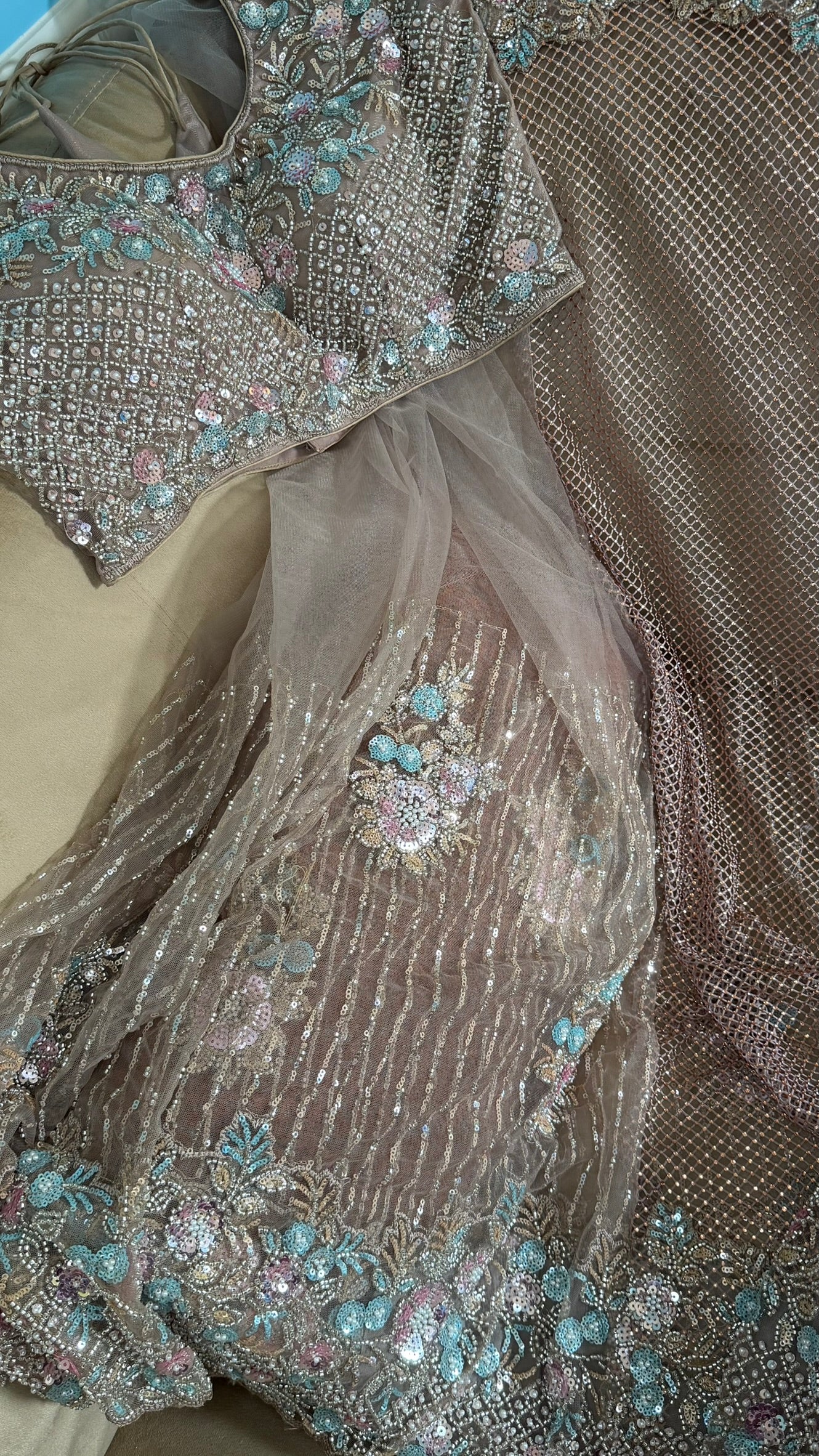 Net saree with heavy embroidered blouse and border