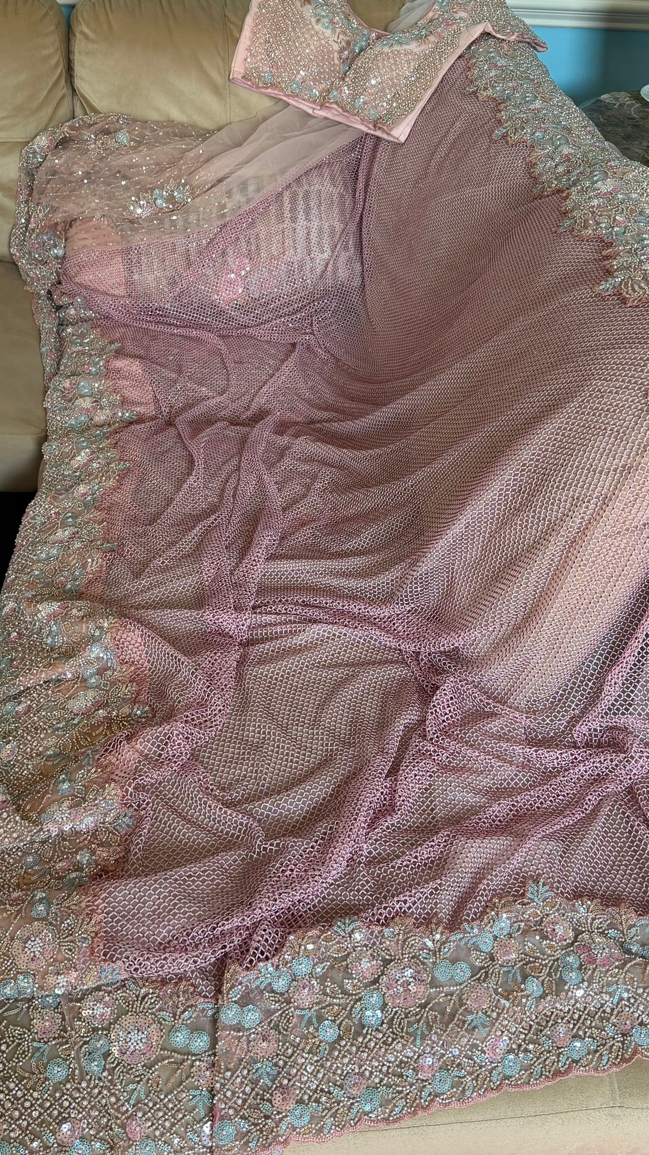 Net saree with heavy embroidered blouse and border