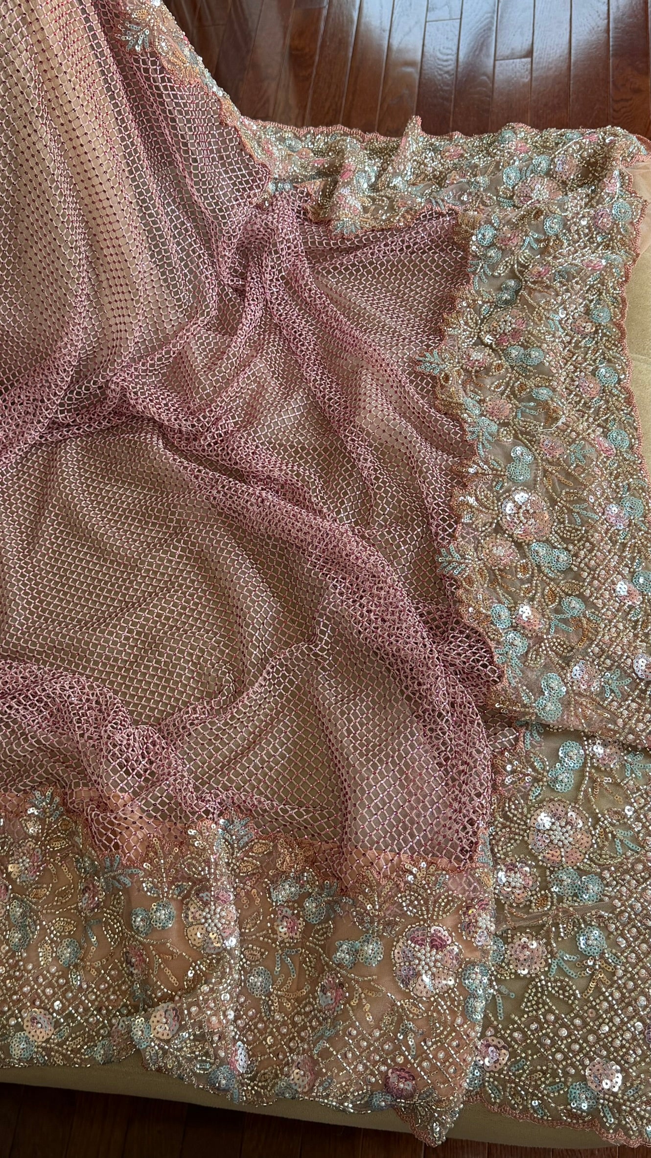 Net saree with heavy embroidered blouse and border