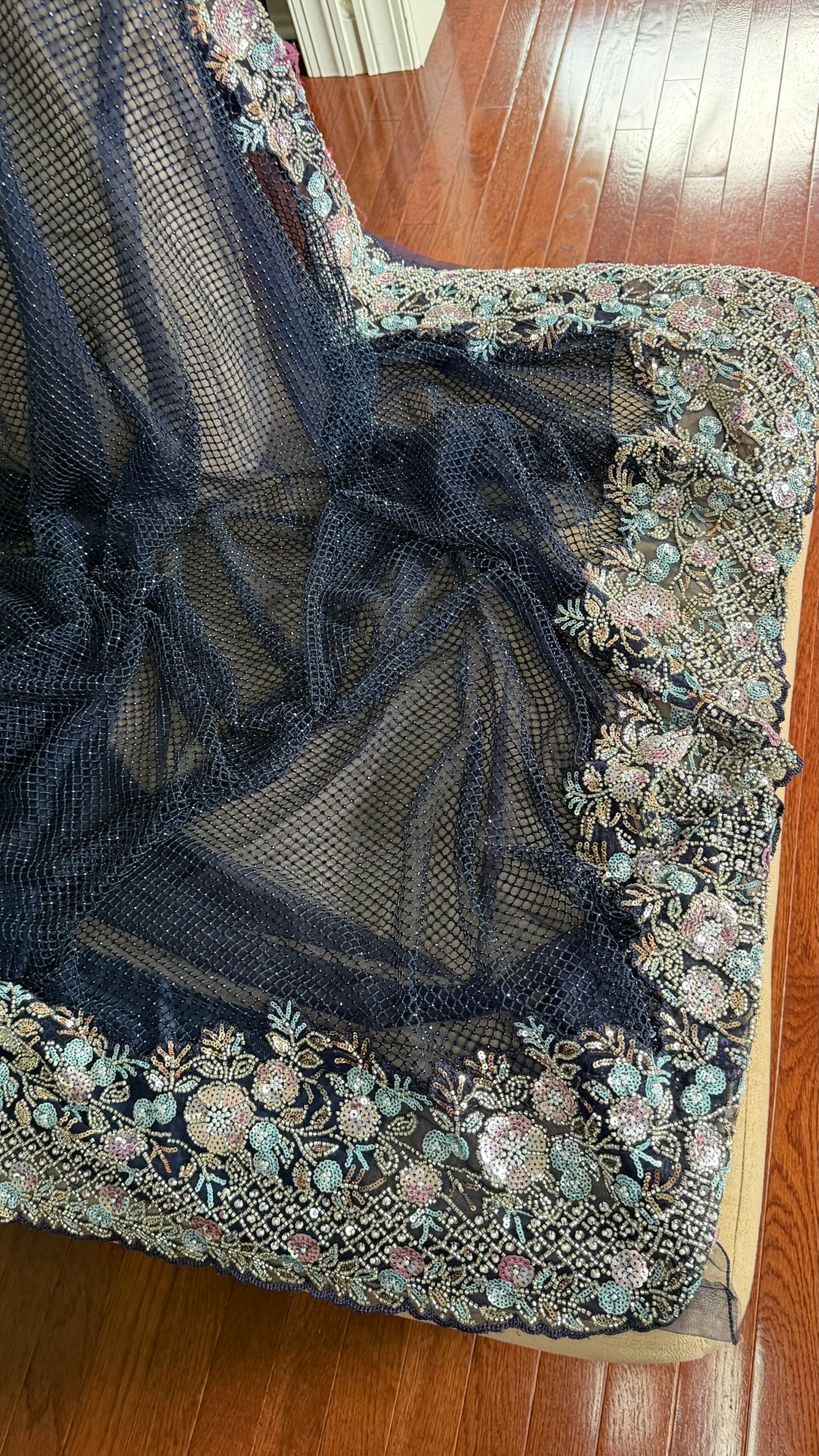 Net saree with heavy embroidered blouse and border