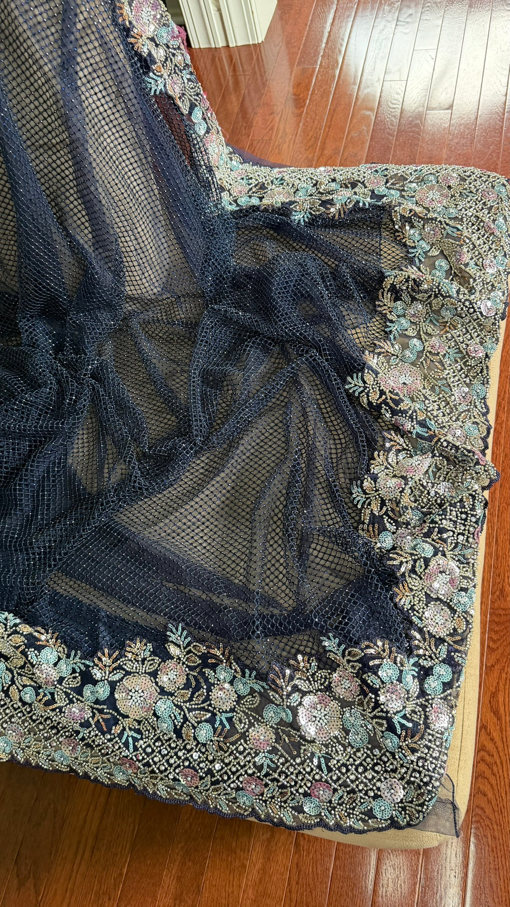Net saree with heavy embroidered blouse and border