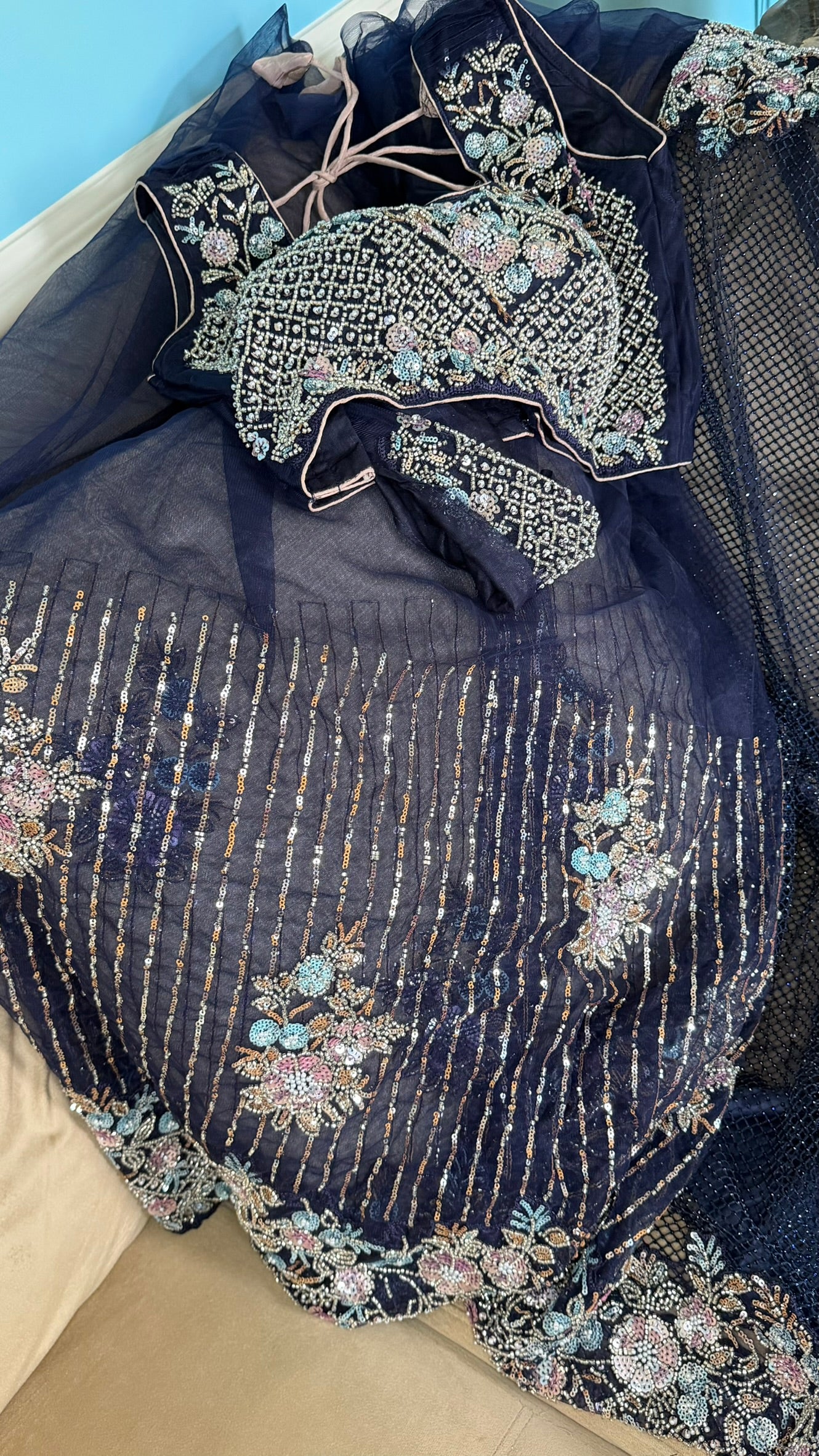 Net saree with heavy embroidered blouse and border