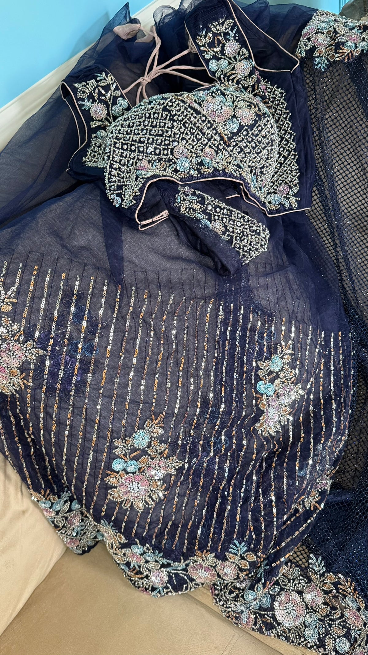 Net saree with heavy embroidered blouse and border