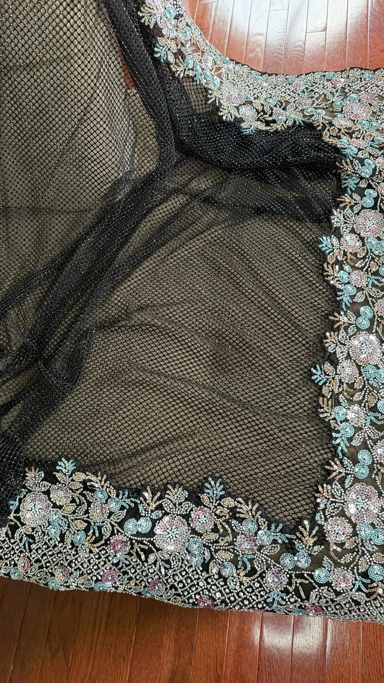 Net saree with heavy embroidered blouse and border