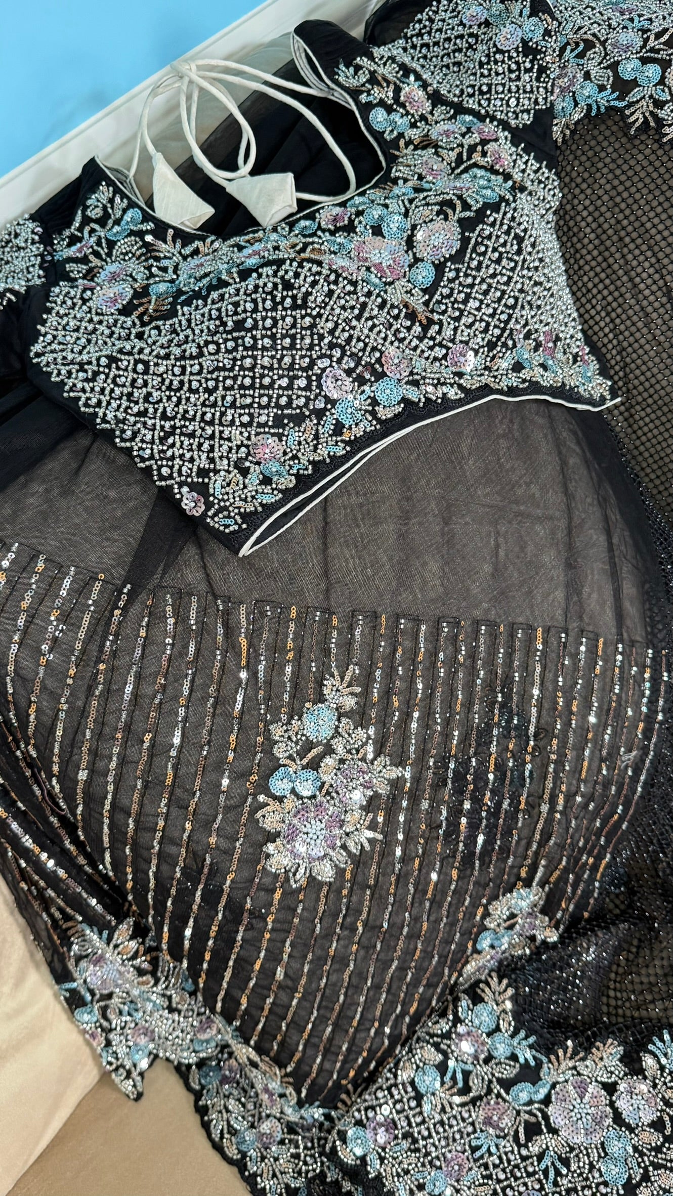 Net saree with heavy embroidered blouse and border