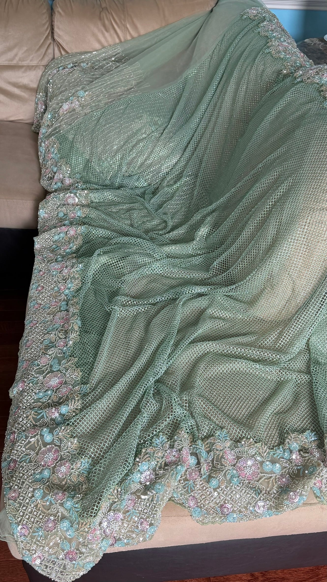 Net saree with heavy embroidered blouse and border
