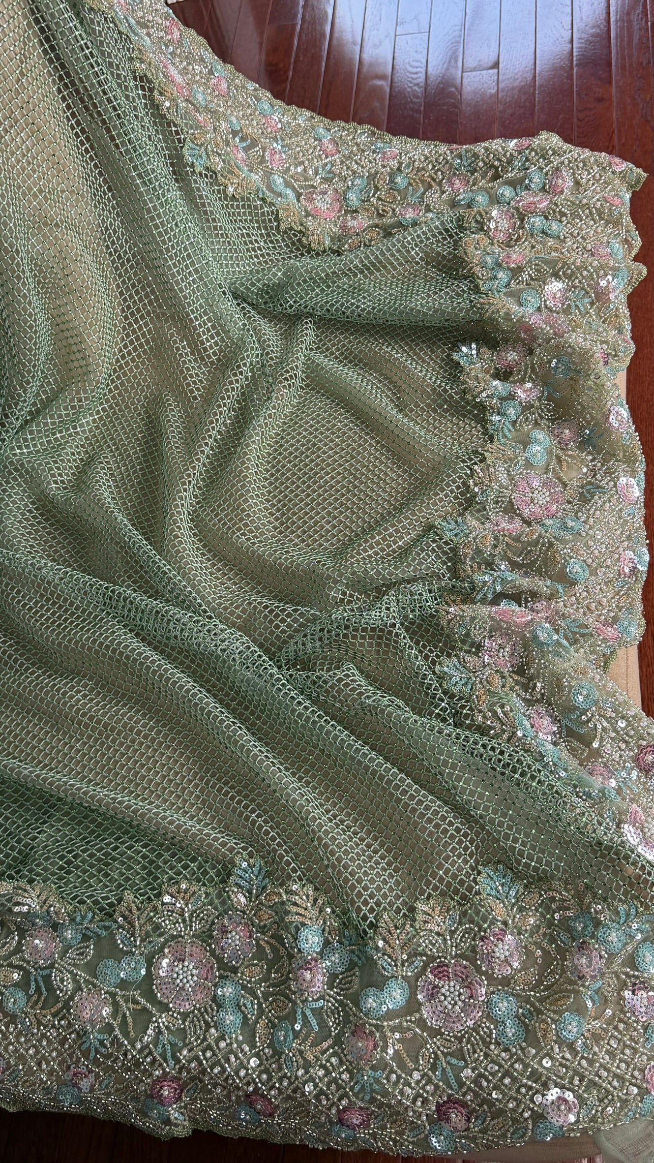 Net saree with heavy embroidered blouse and border