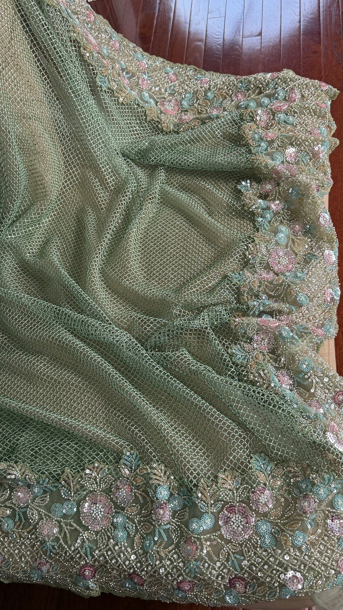 Net saree with heavy embroidered blouse and border