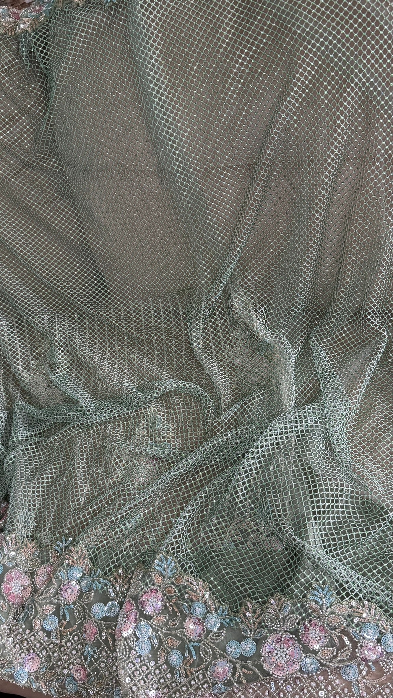Net saree with heavy embroidered blouse and border
