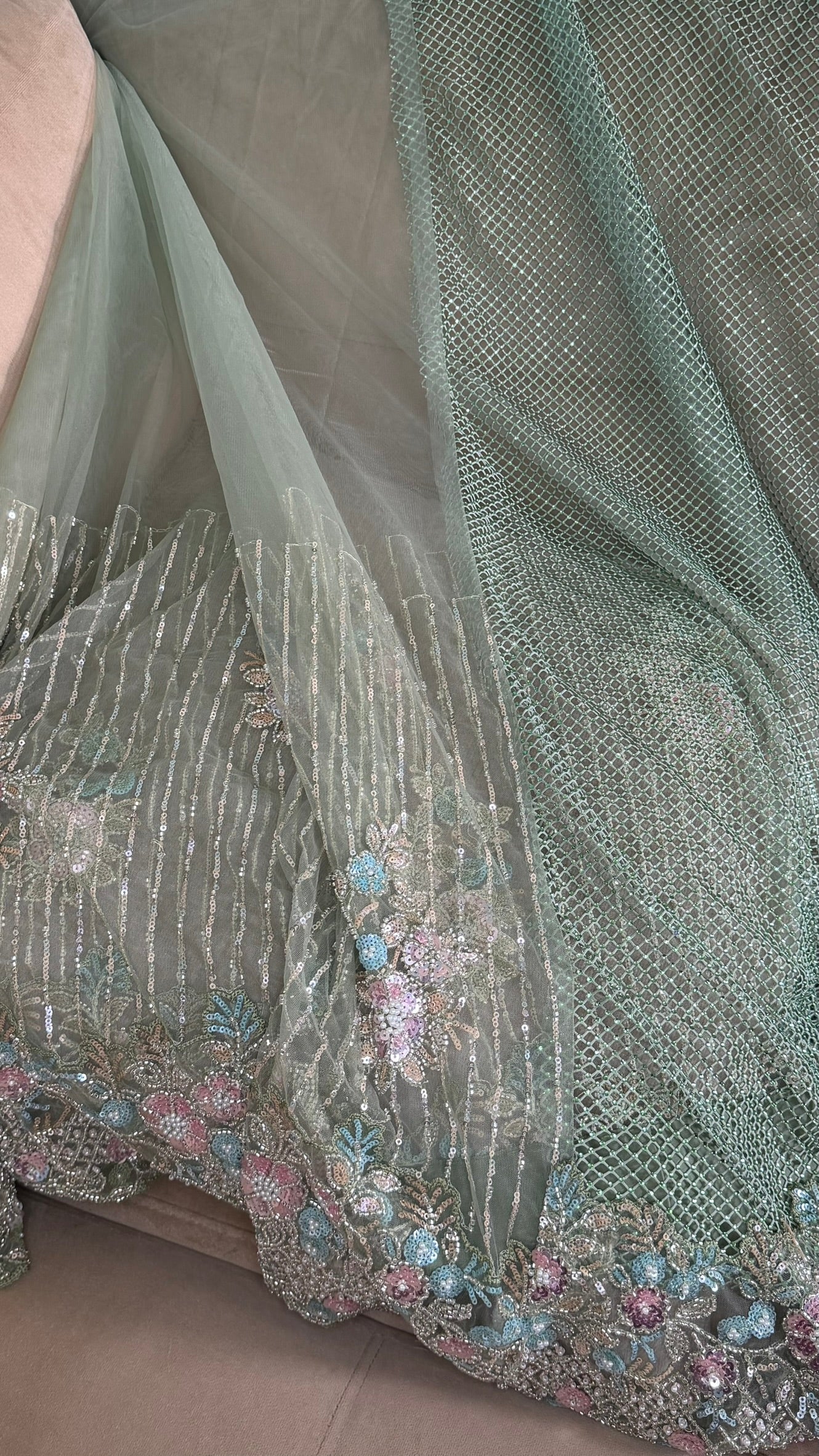 Net saree with heavy embroidered blouse and border