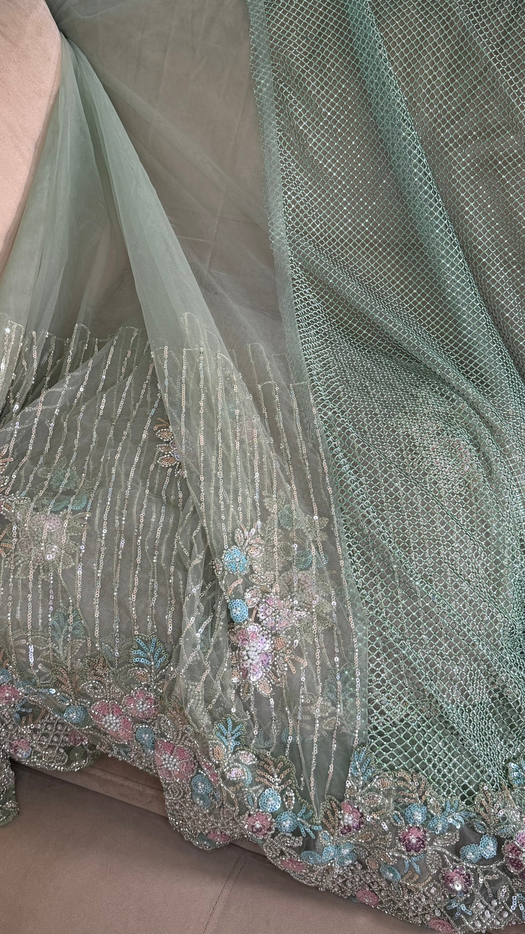 Net saree with heavy embroidered blouse and border