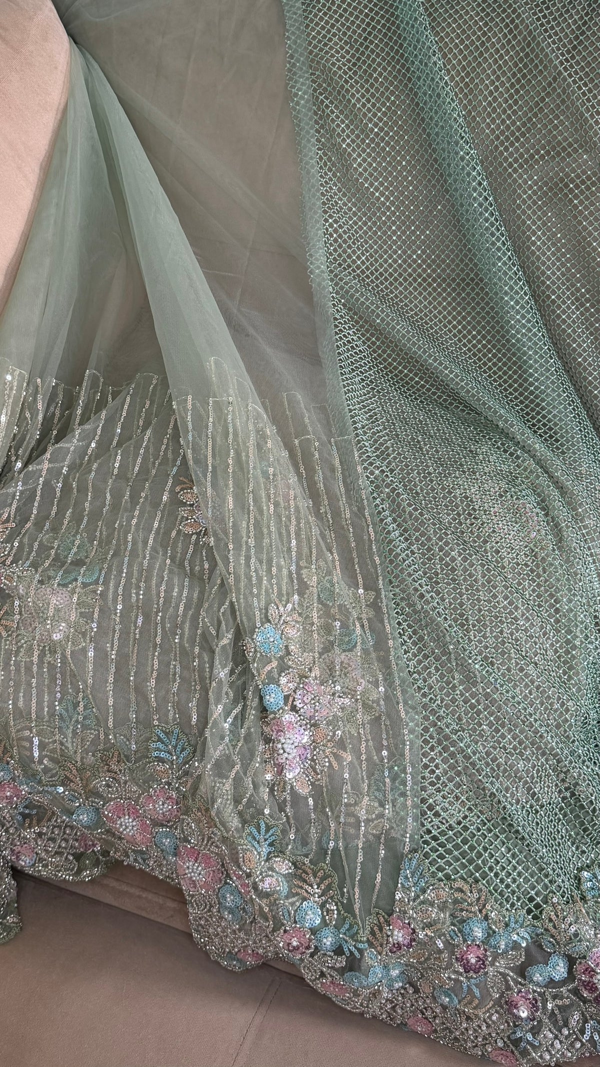 Net saree with heavy embroidered blouse and border