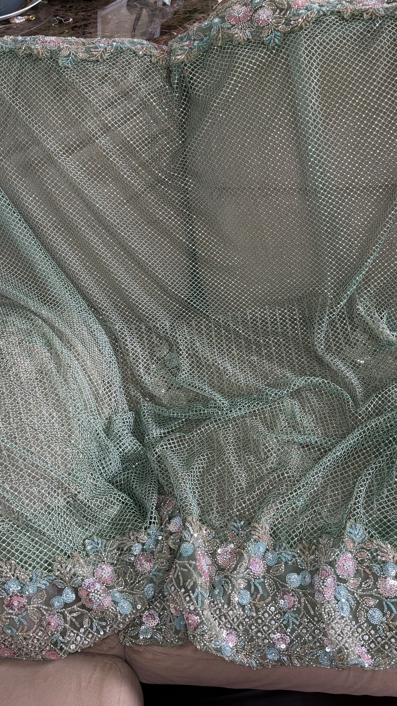 Net saree with heavy embroidered blouse and border