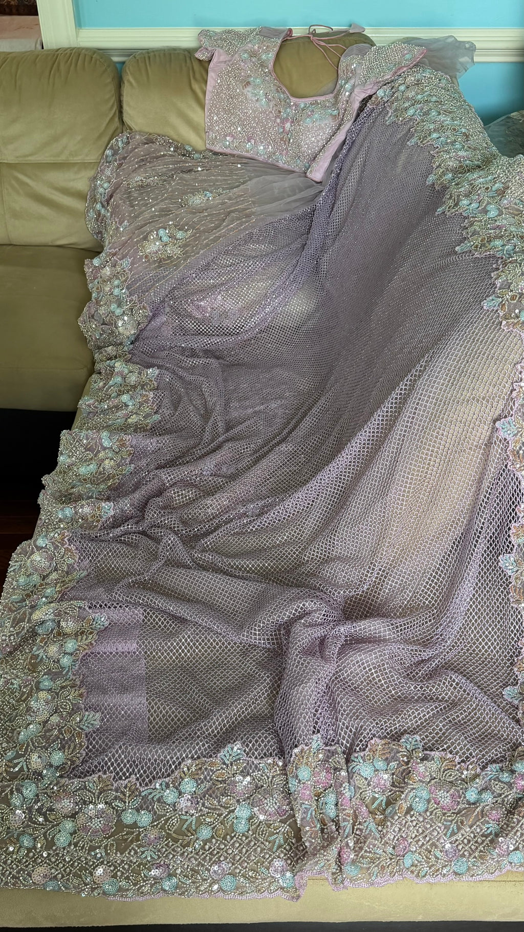 Net saree with heavy embroidered blouse and border